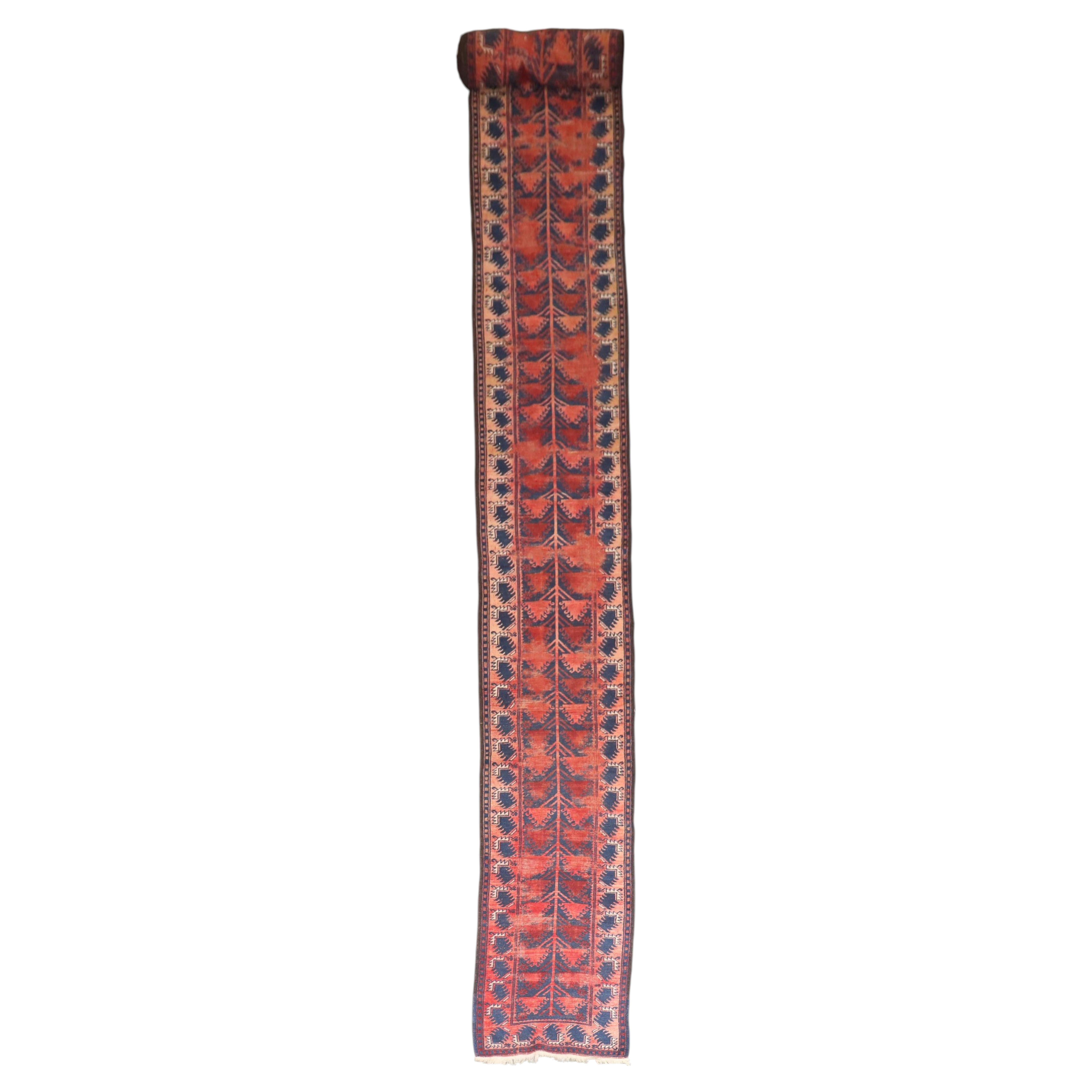 Zabihi Collection Early 20th Century Long Narrow Balouch Runner, 2' x 19'9'' For Sale