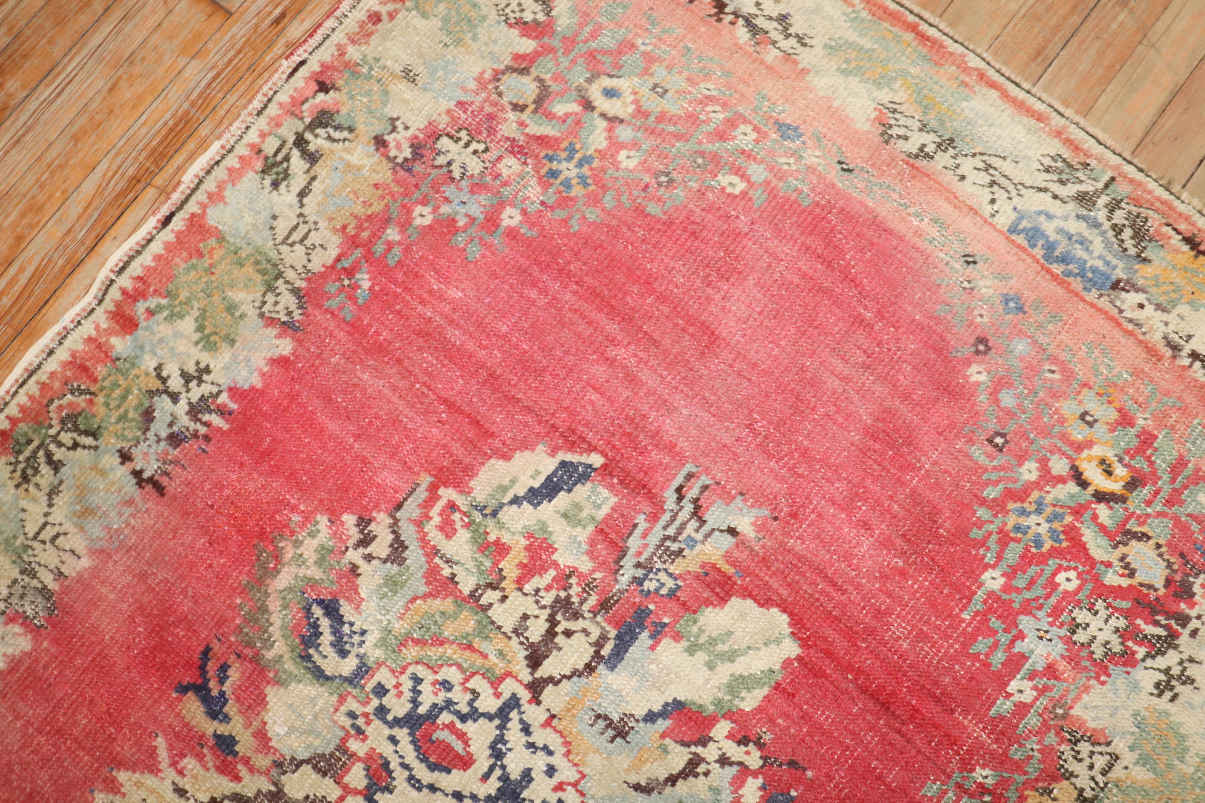Zabihi Collection Early 20th Century Pink Turkish Ghiordes Rug In Good Condition For Sale In New York, NY