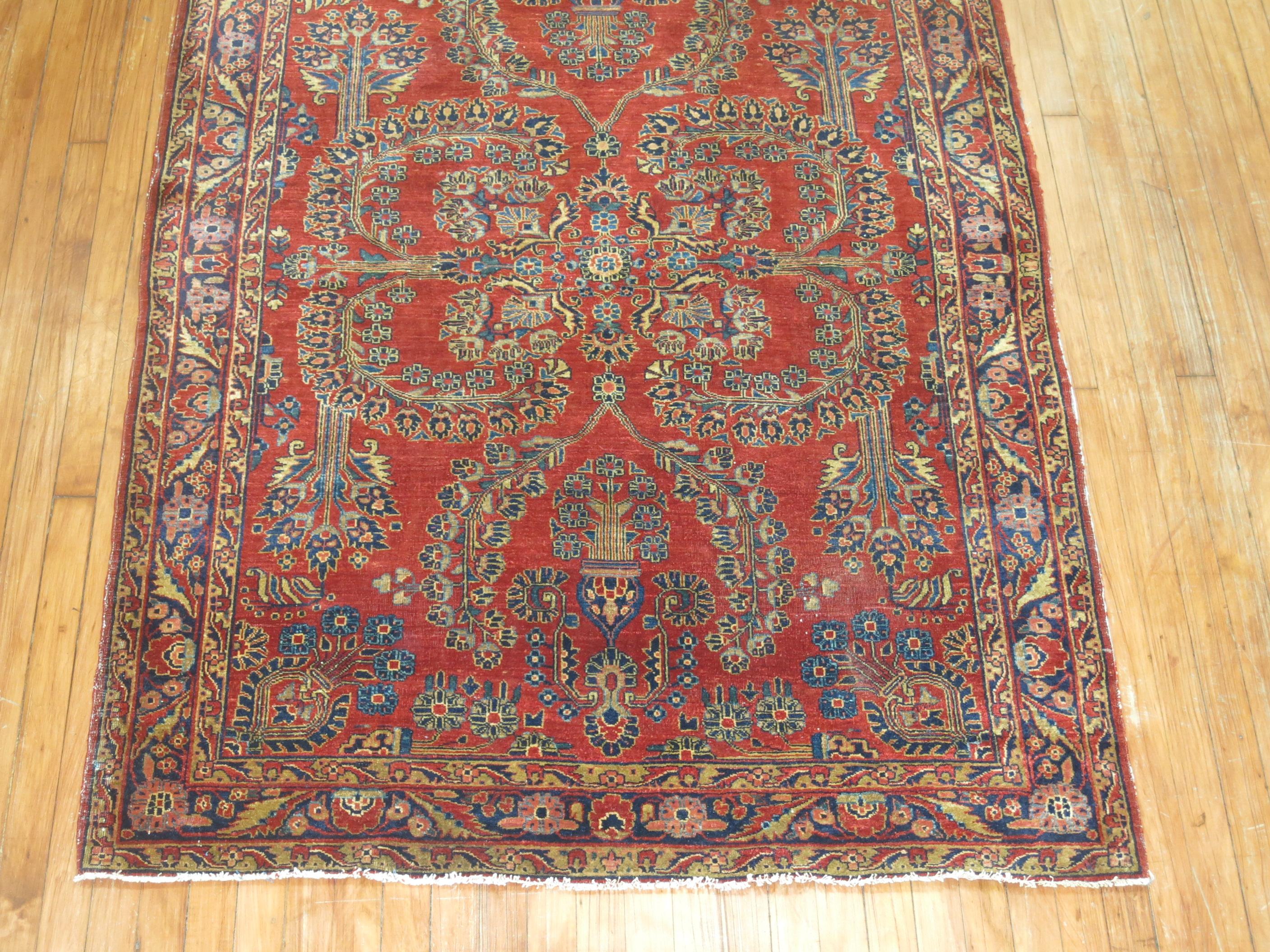 an early 20th Century Persian Red Sarouk Rug

Details
rug no.	9061
size	4' 4