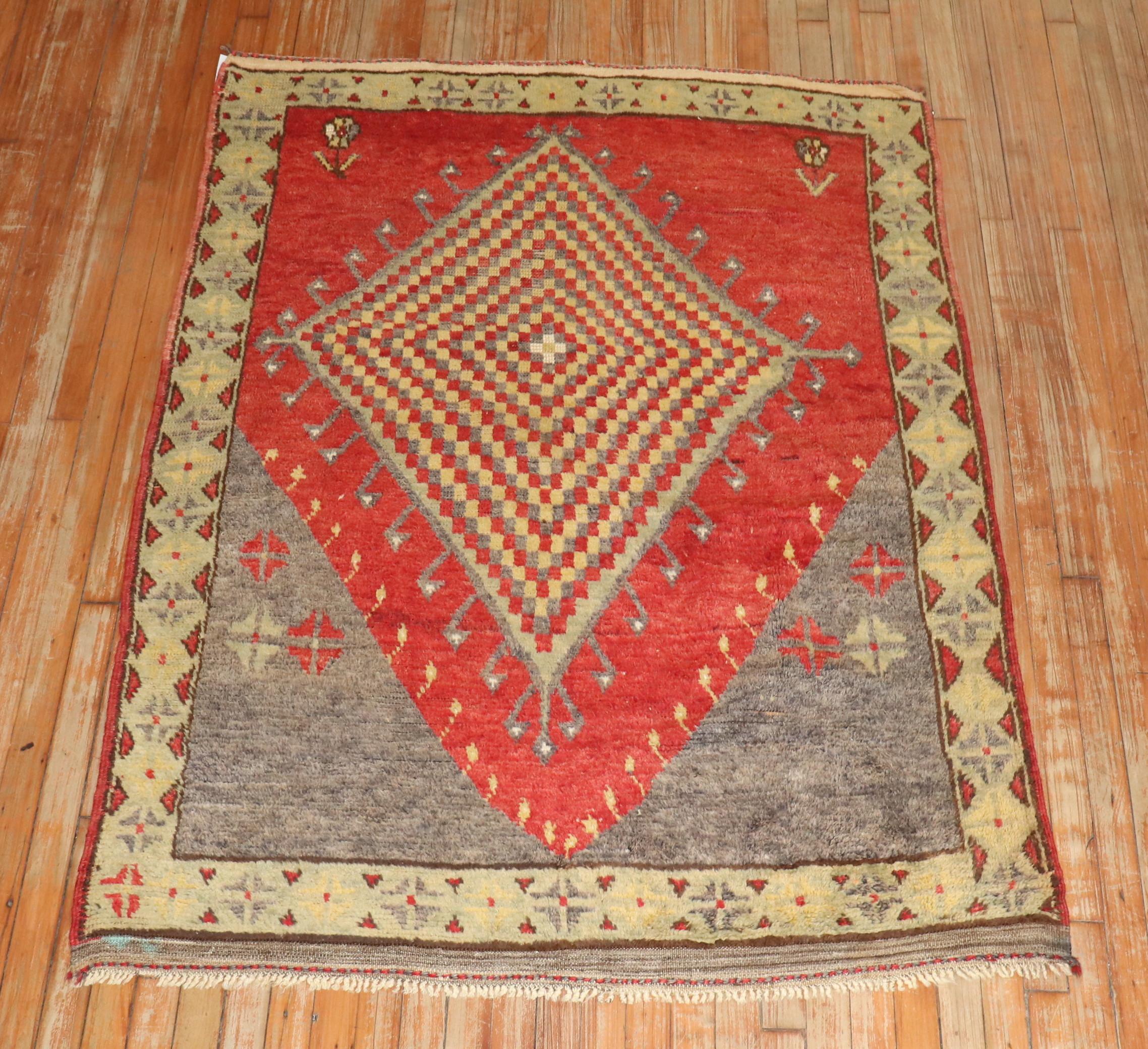 A Mid 20th Century central Anatolian Turkish geometric rug

4'4'' x 5'7''