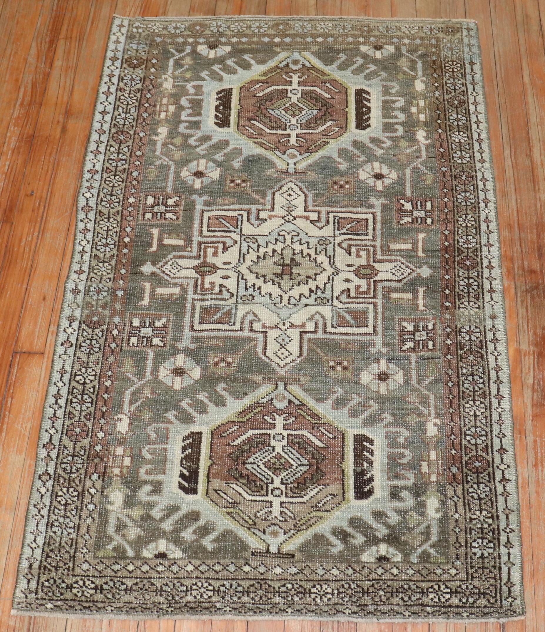 A charcoal color Persian Heriz Rug from the early 20th Century

Measures: 2'9” x 4'4''