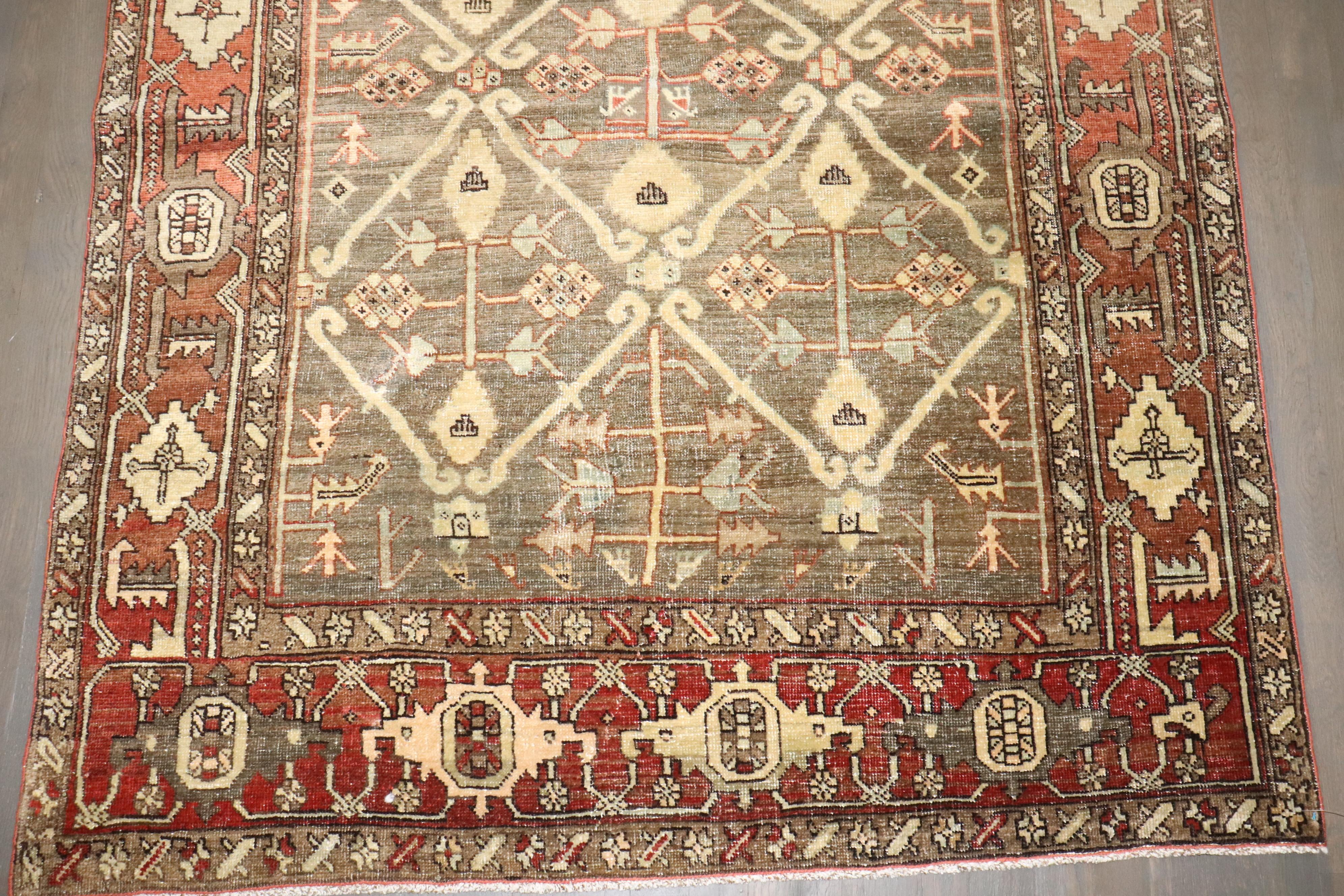 Wool Zabihi Collection Green Brown Masculine Antique 20th Century Persian Heriz Rug For Sale