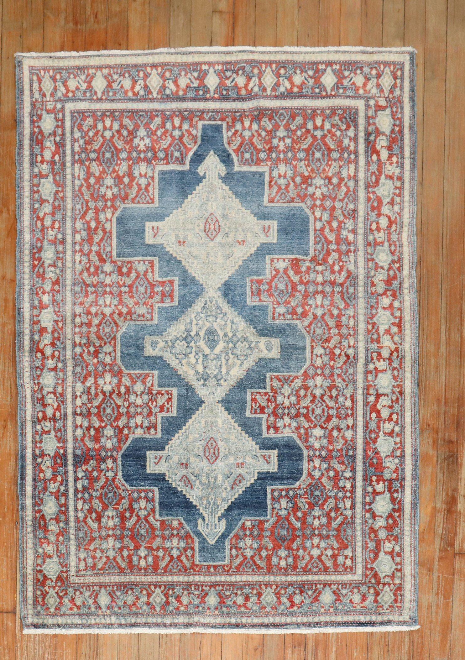 an early 20th century Persian scatter size rug

Measures: 3'7