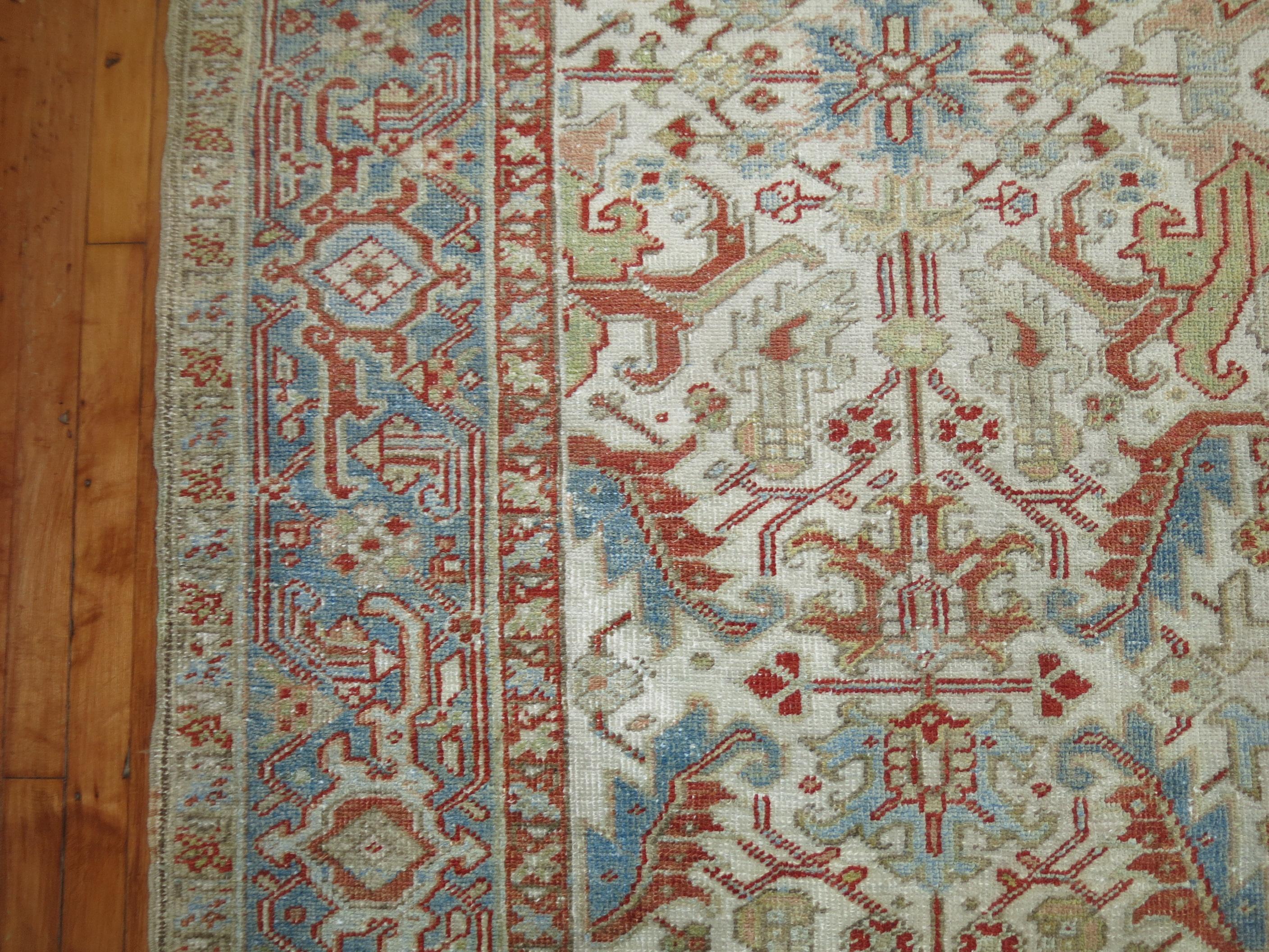 20th Century Zabihi Collection Ivory Antique Persian Heriz Rug For Sale