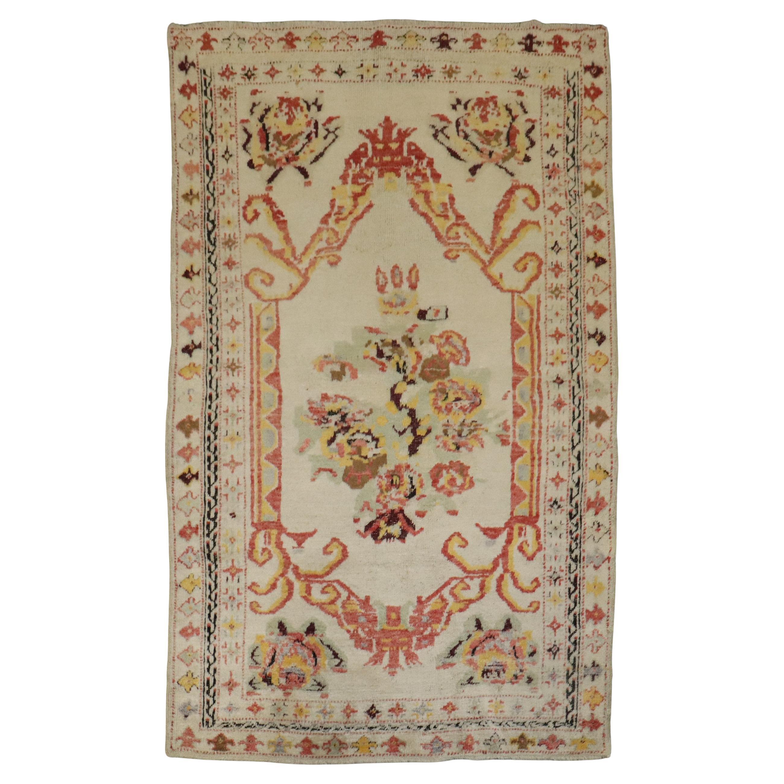 Tapis Ghiordes turc ancien ivoire de la collection Zabihi