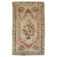 Tapis Ghiordes turc ancien ivoire de la collection Zabihi