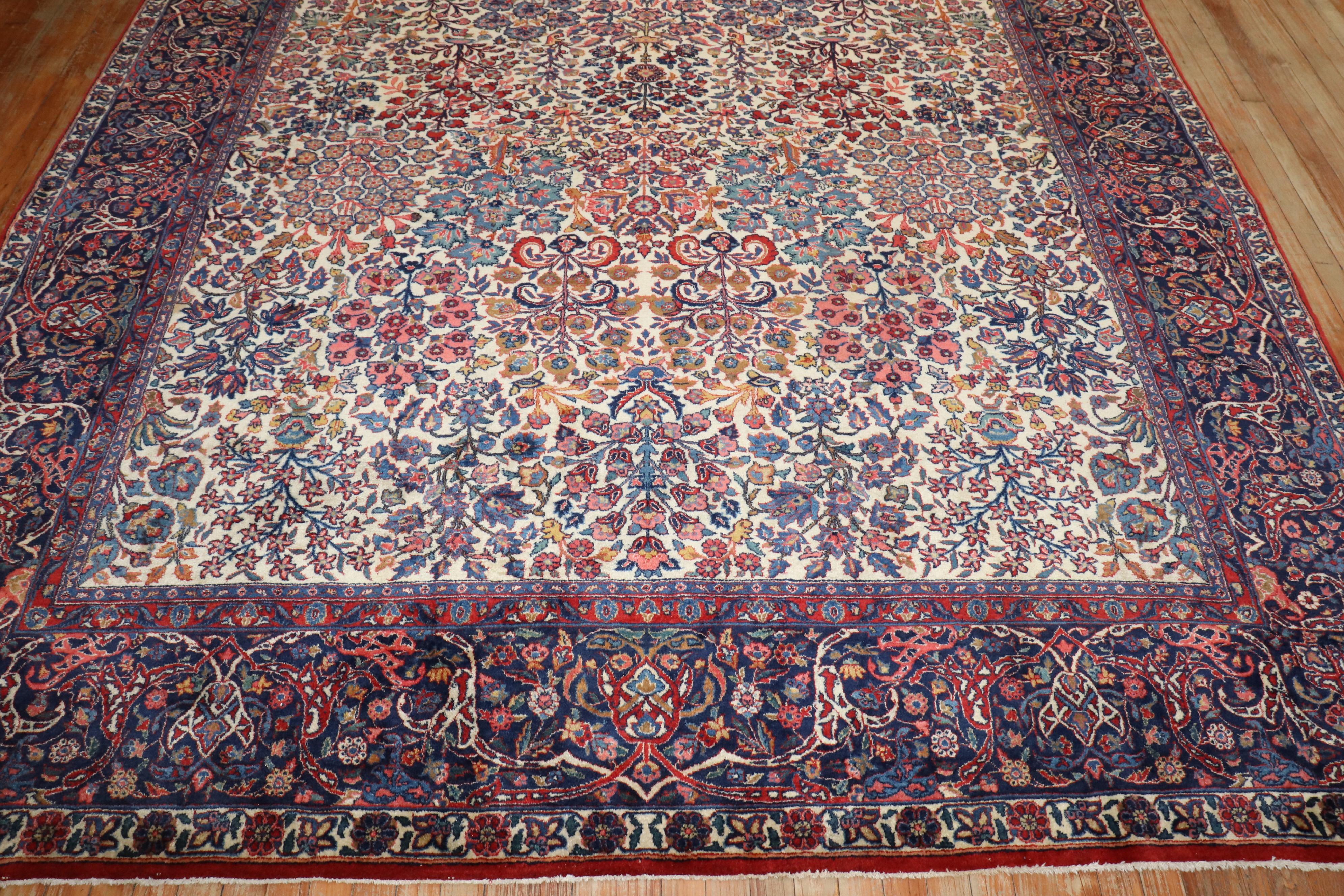 An early 20th Century Ivory Ground Persian Kashan room-size rug

Measures: 8'8'' x 11'2''.

 