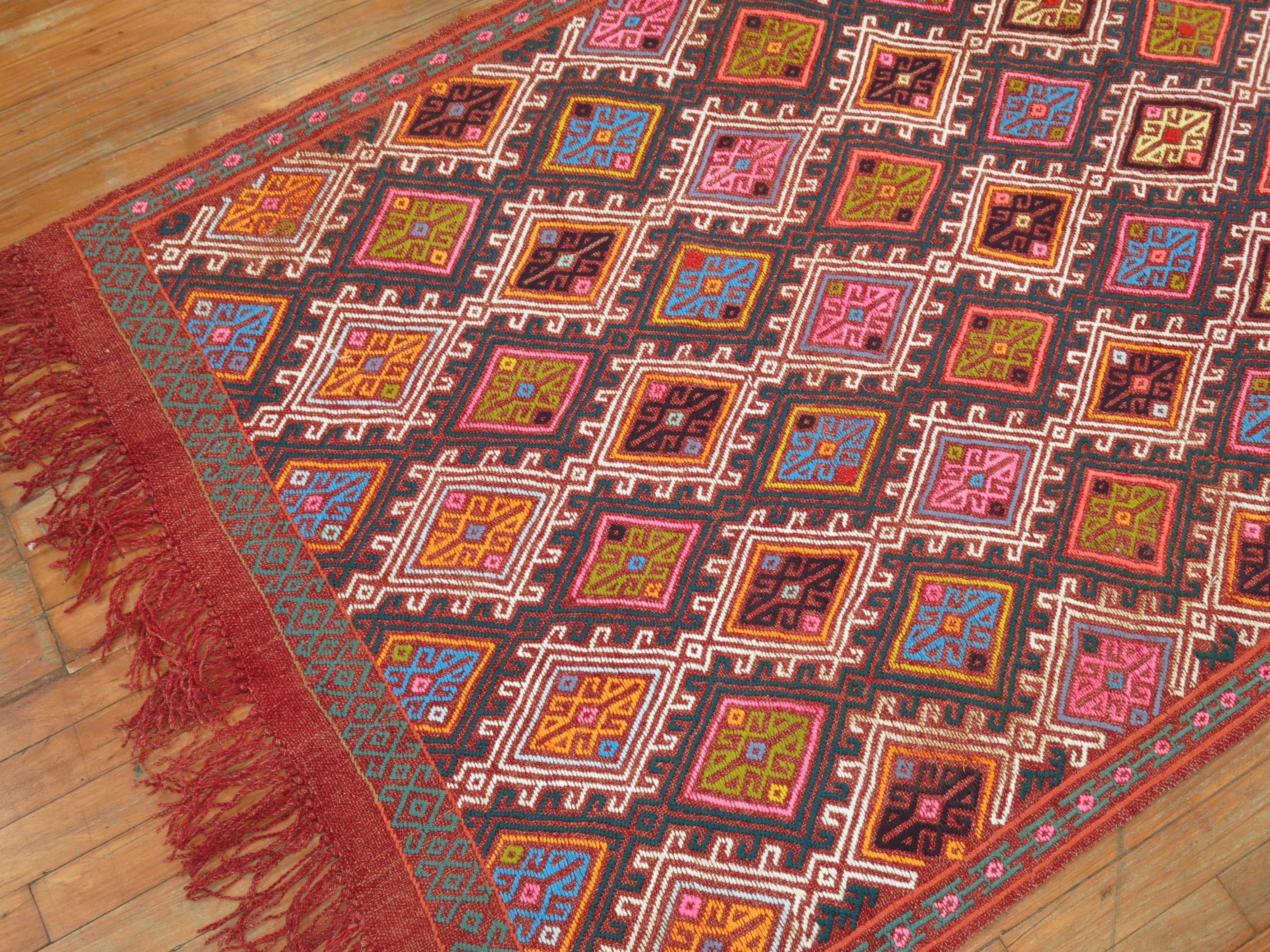 Mid-20th Century Colorful Turkish Jajim kilim 

Measures: 3'8'' x 6'9”

With the Jijim weaving technique, different colored threads are applied between the weft and warp threads, on the reverse of the weave. It is often used to decorate a