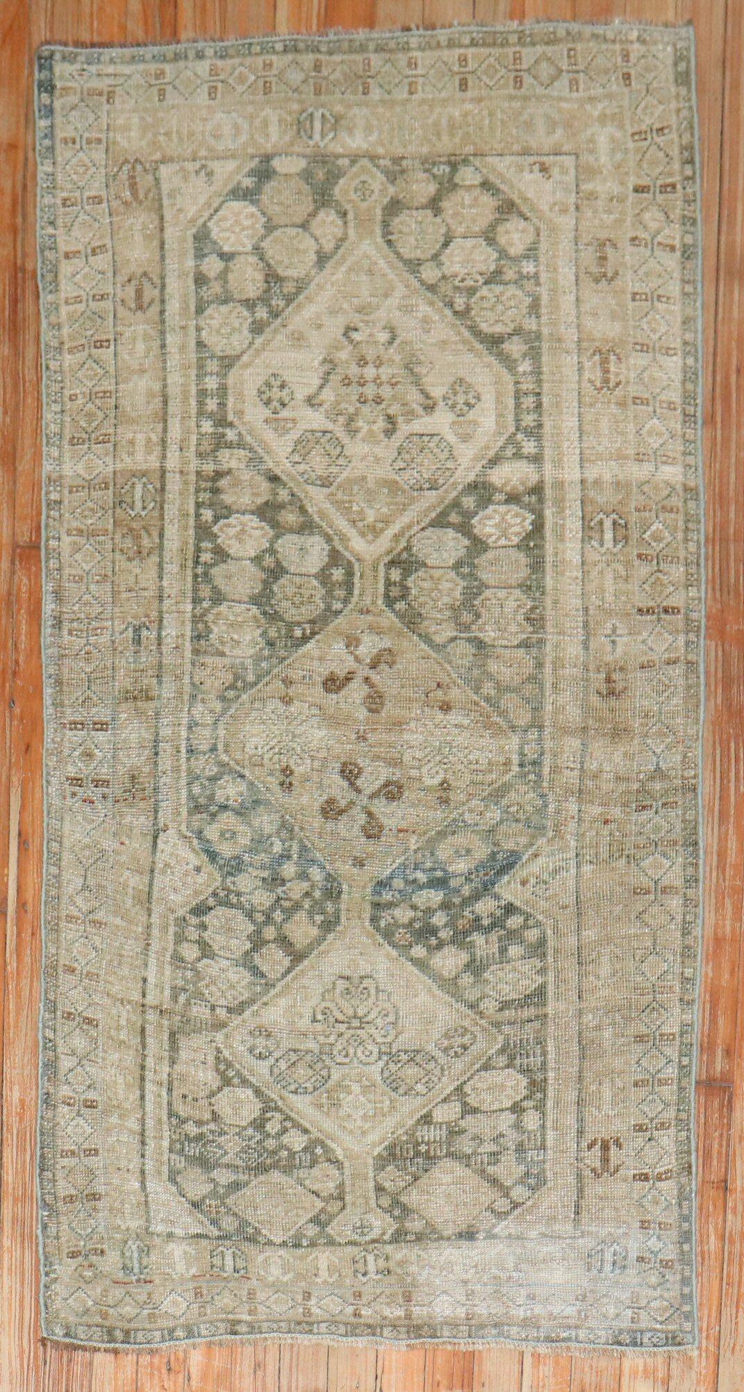 A small size muted color early 20th-century Persian Kurd rug 

Measures: 2'6