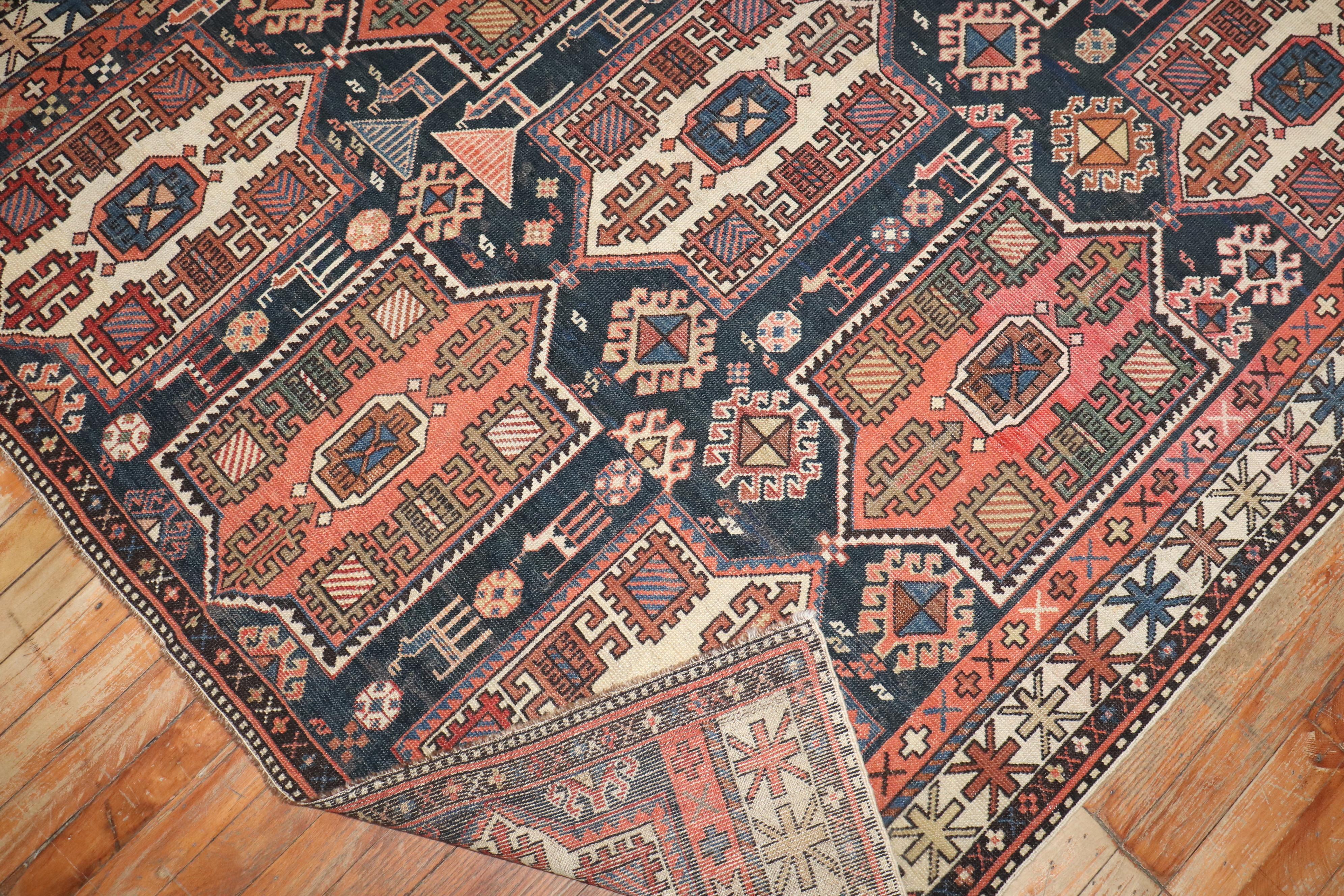 A large intermediate size Caucasian rug from the early 20th century

Measures: 5'2'' x 9'4''.

Antique Caucasian rugs from the Shirvan district village are still considered one of the best decorative and collector type of rugs from that the