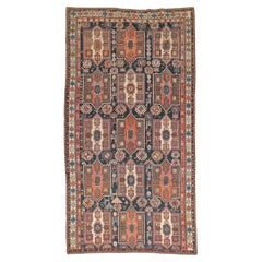 Zabihi Collection grand tapis tribal caucasien ancien