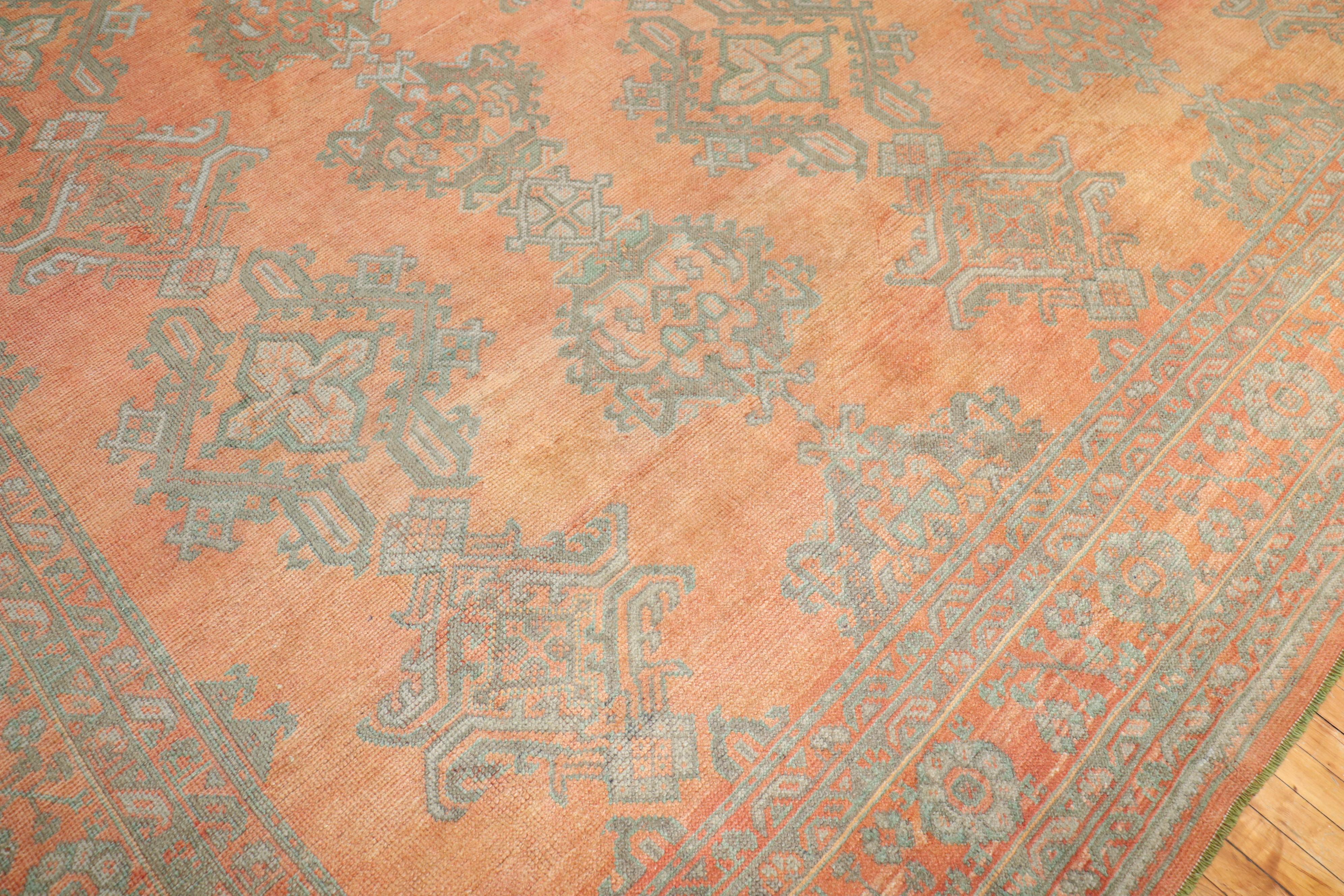 An early 20th-century antique Turkish Oushak Large size rug, circa 1920.

Measures: 13' x 15'7