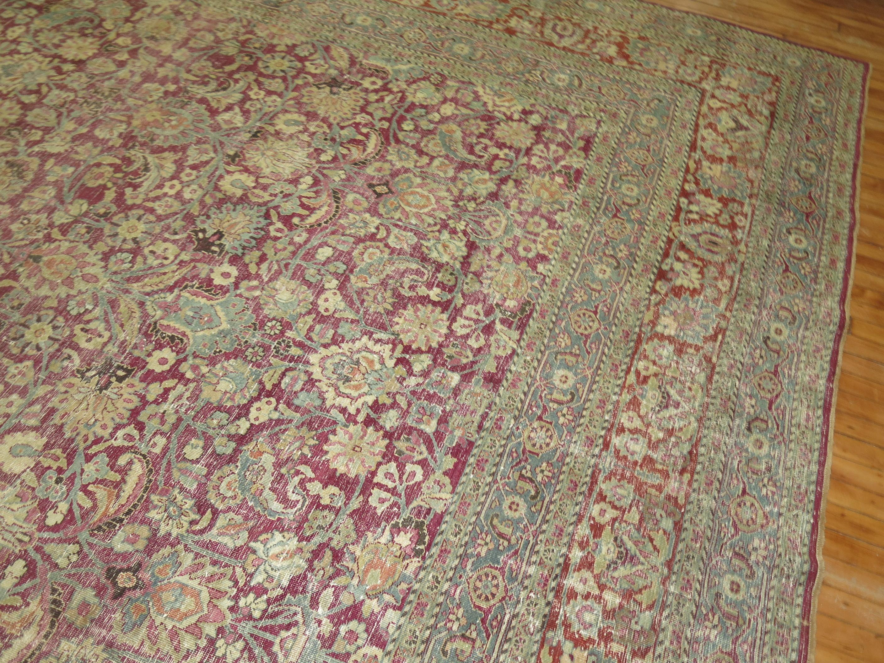 Zabihi Collection Large Raspberry Antique Persian Meshed Rug In Good Condition For Sale In New York, NY