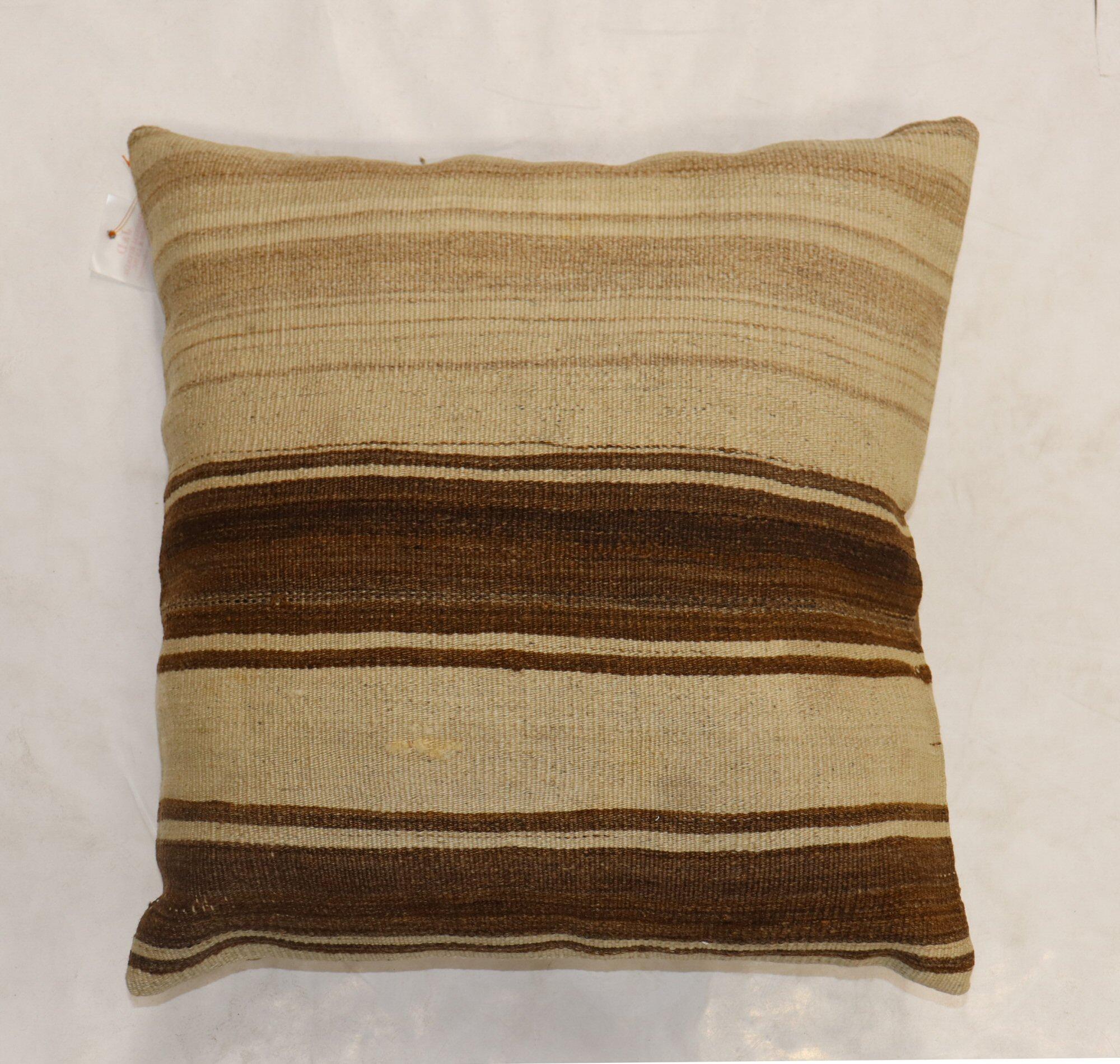 Pillow made from a 21st-century Turkish Kilim with cotton back. Zipper closure and foam insert provided.


Measures: 23