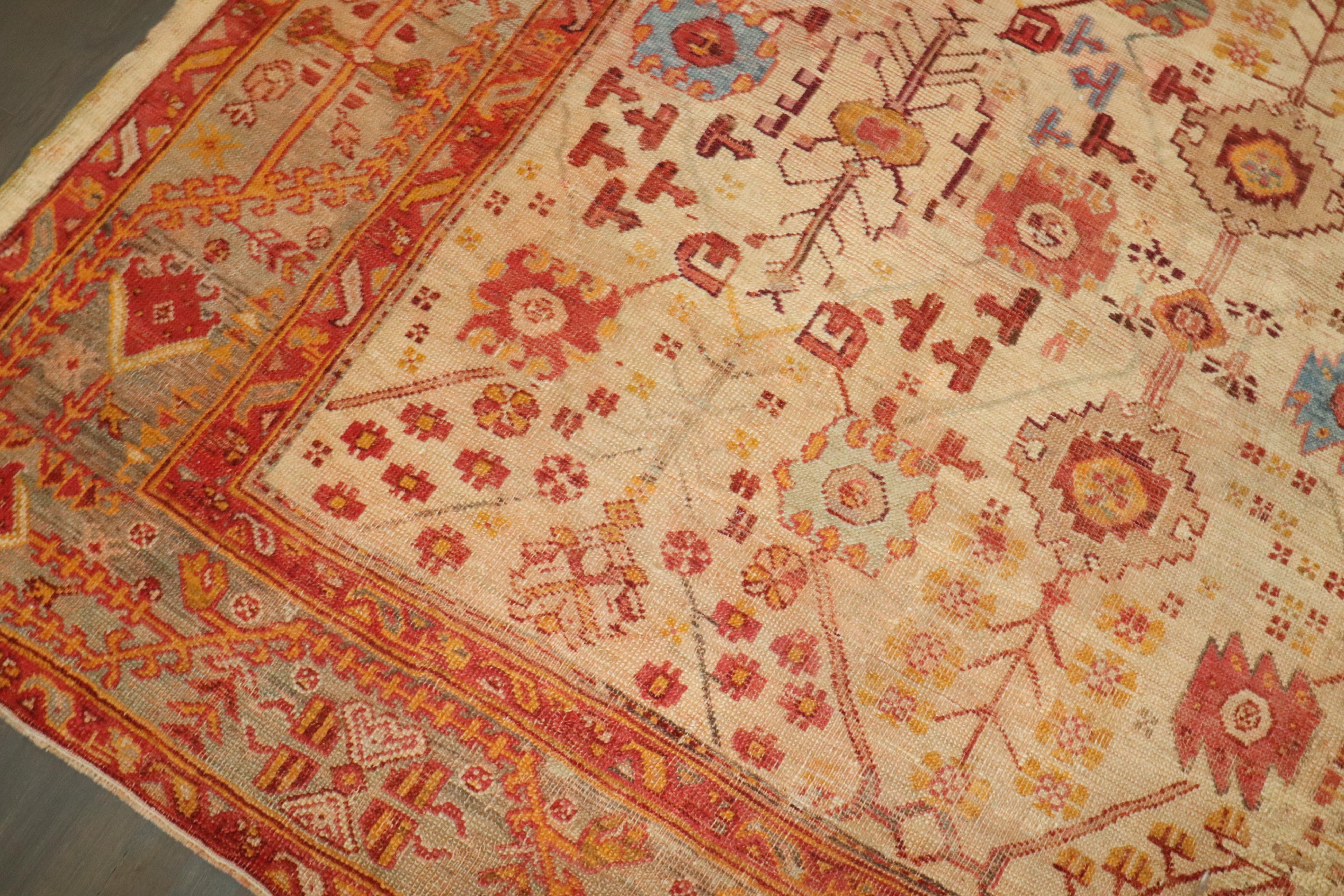 Zabihi Collection Late 19th Century Antique Turkish Oushak Rug In Fair Condition For Sale In New York, NY