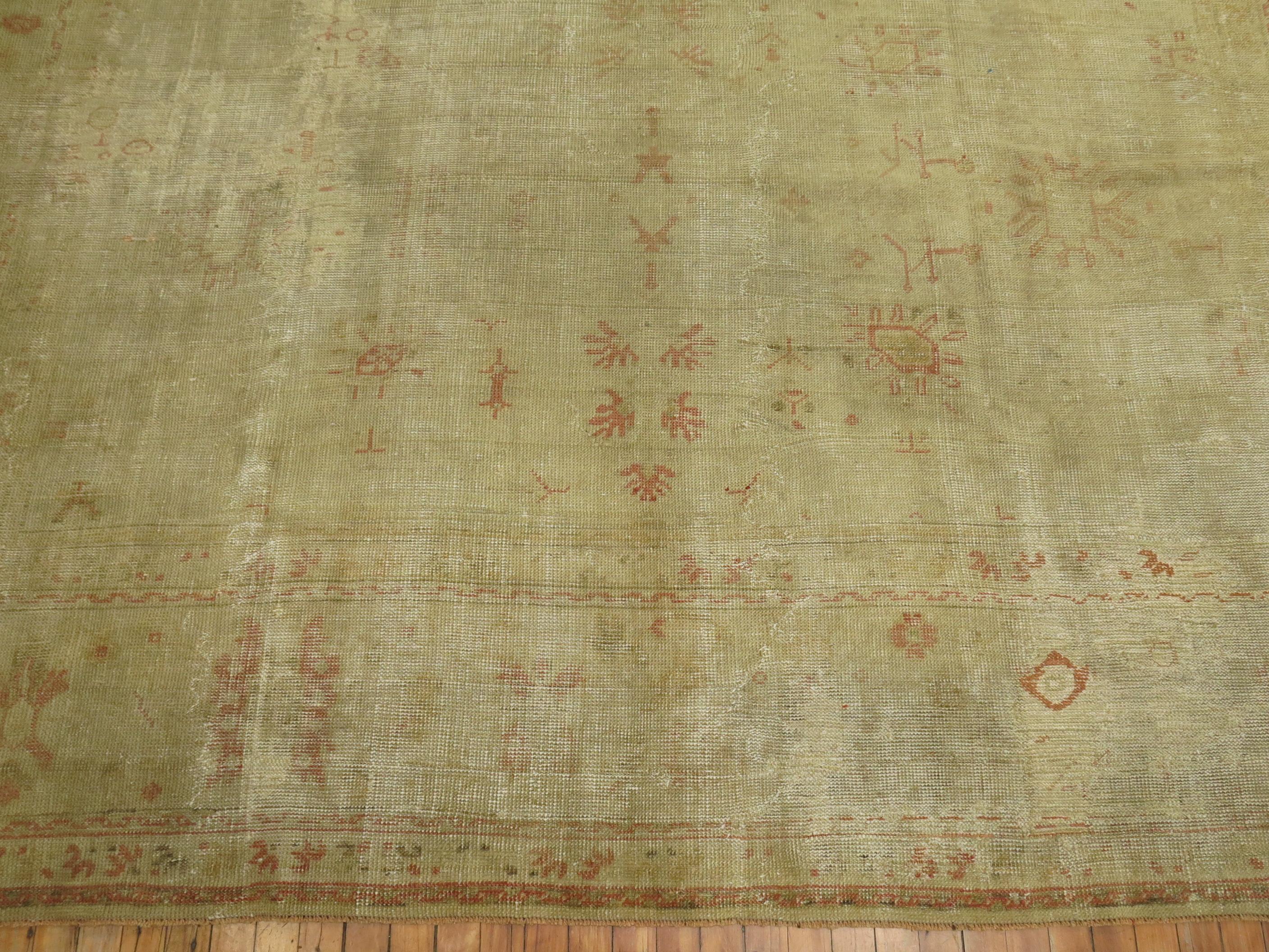 Zabihi Collection Late 19th Century Antique Turkish Oushak Worn Rug In Fair Condition For Sale In New York, NY