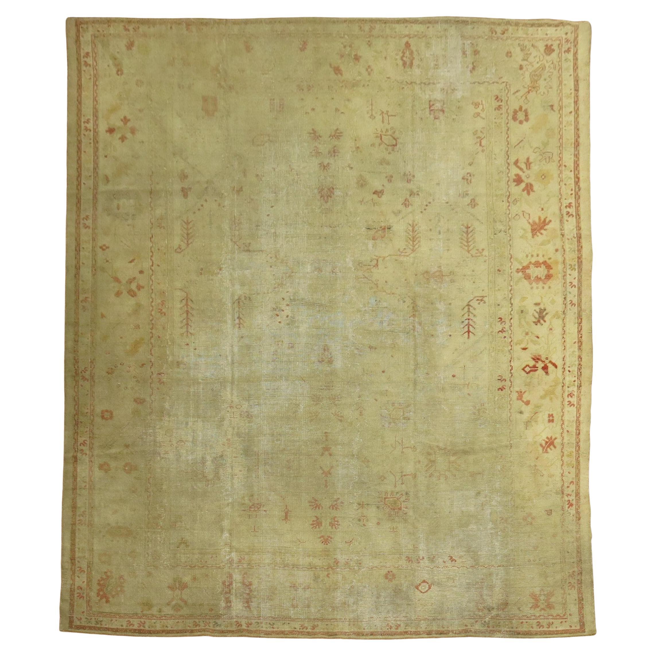 Zabihi Collection Late 19th Century Antique Turkish Oushak Worn Rug For Sale