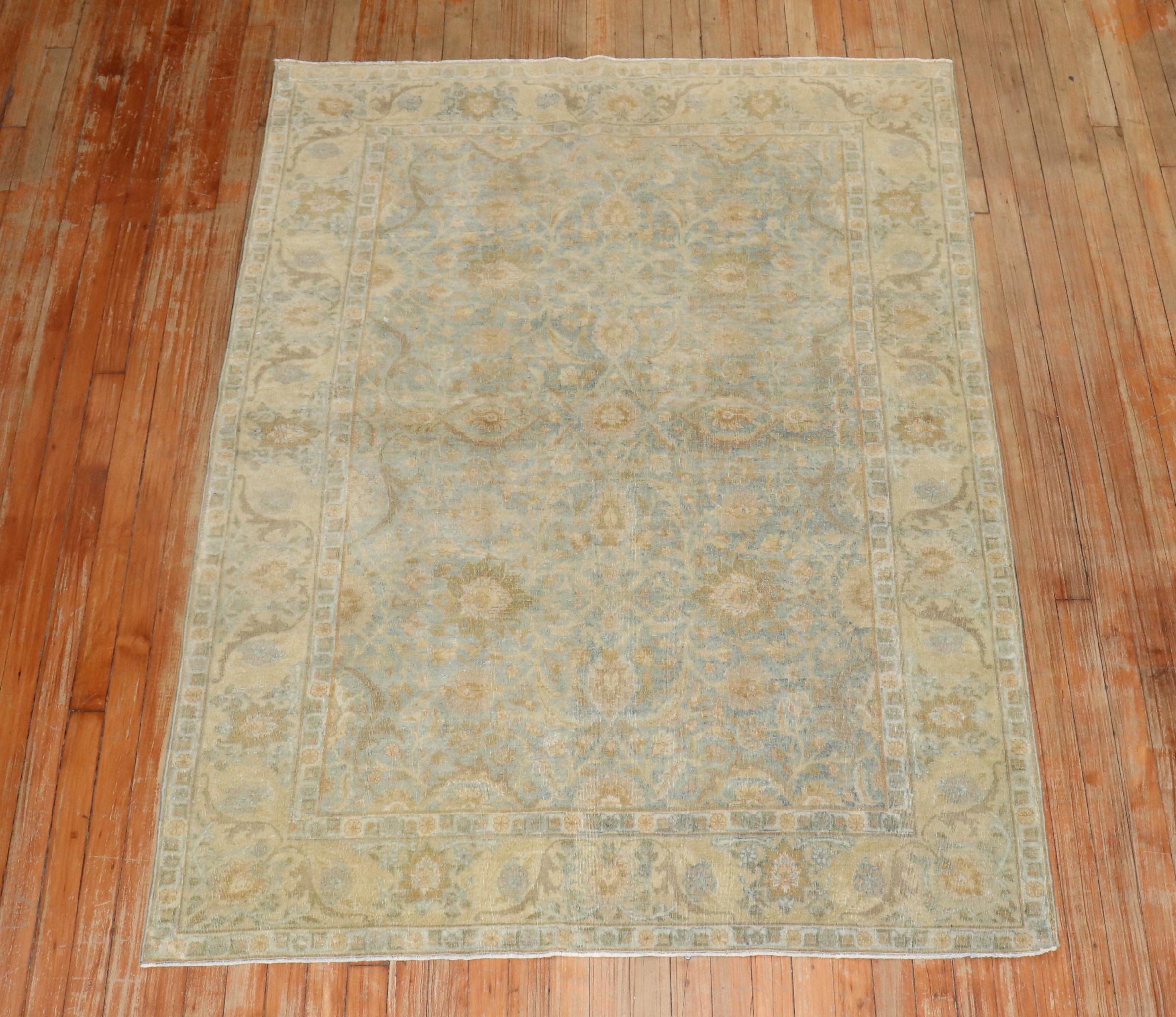 1920s Persian Tabriz rug in light blue and light yellow

Measures: 4'5''' x 6'.