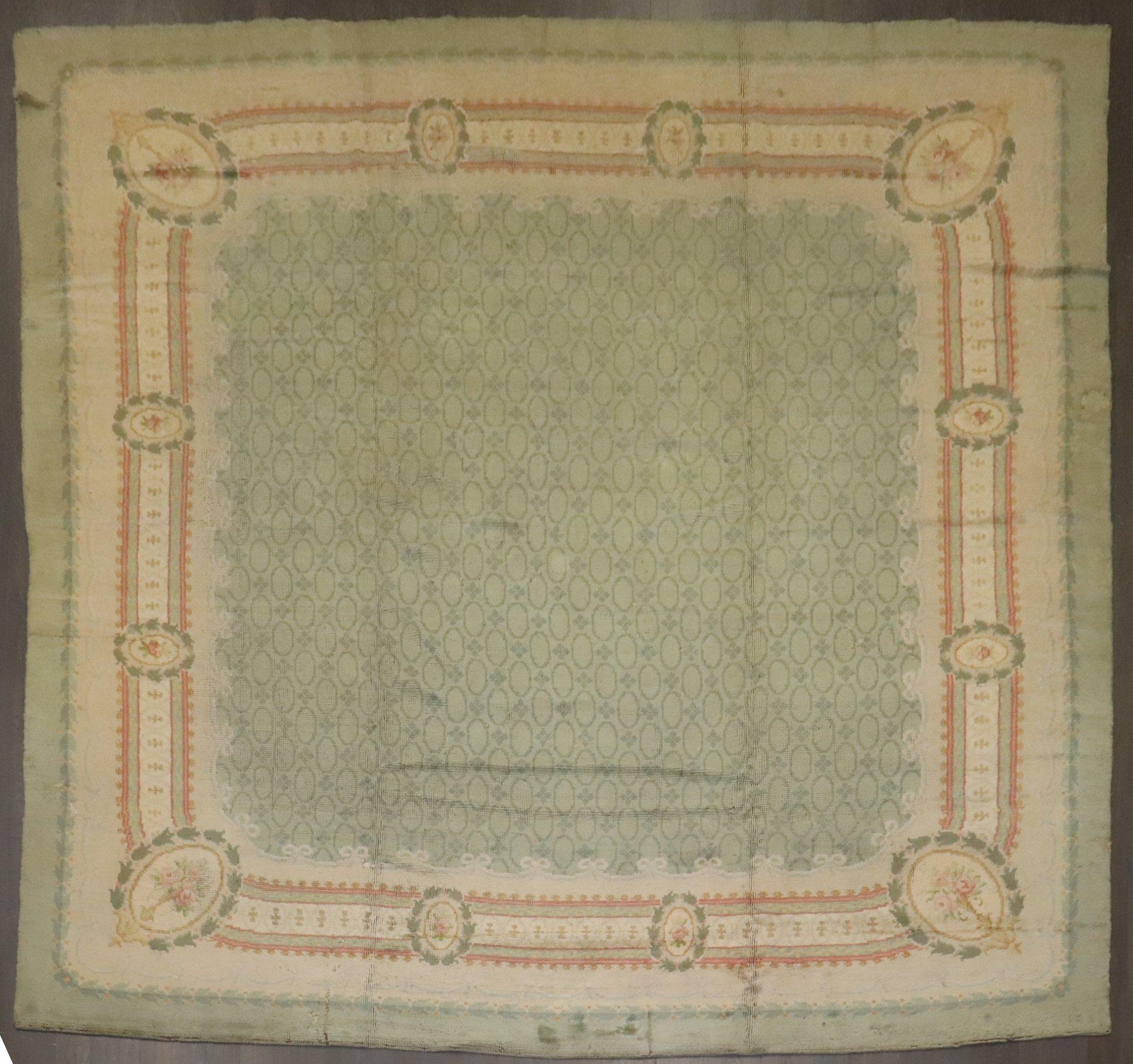 A square size Irish Donegal Rug in mint green from the early 20th century

Details
rug no.	10786
size	11' 9