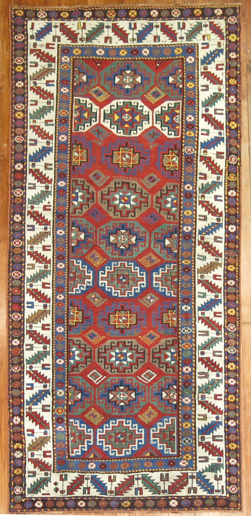 An early 20th century Kazak Moghan small Runner

Details
rug no.	8986
size	3' 6