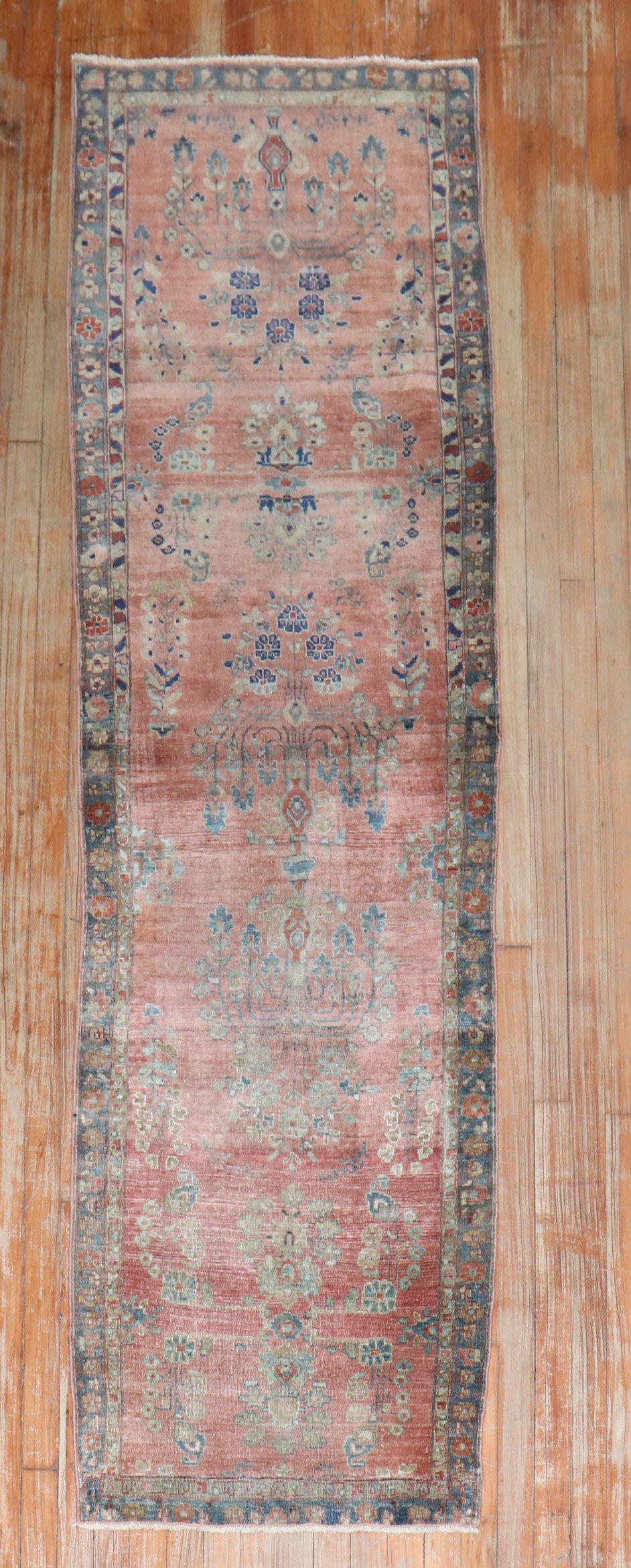 An early 20th Century traditional narrow Persian Kashan runner 

Measures: 2'2'' x 18'