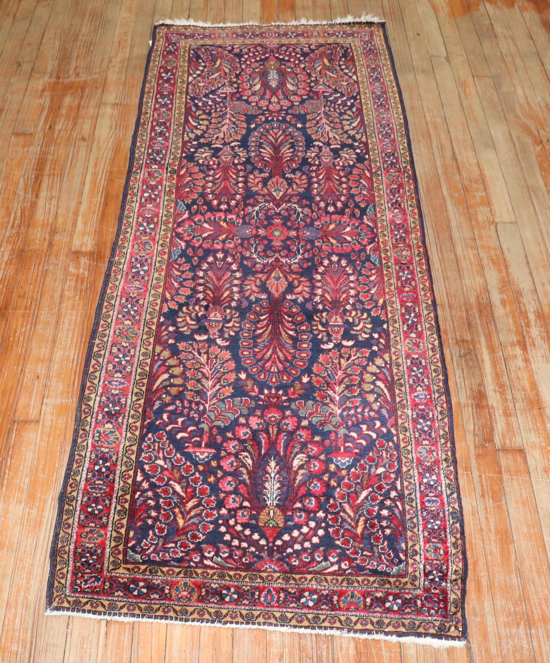 1920s Persian Sarouk small runner with a navy ground and floral design

2'6'' x 6'6''
.
