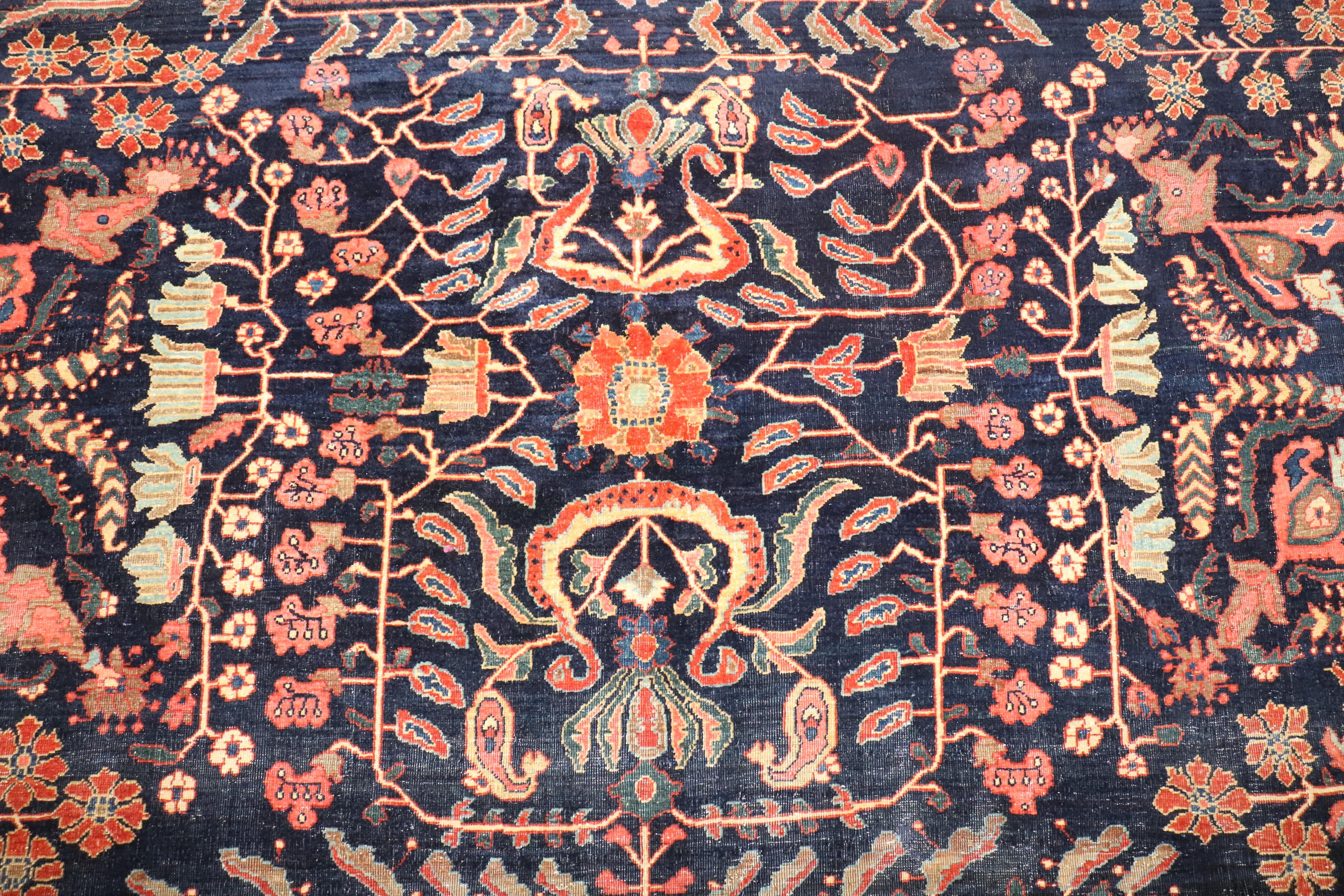 Wool Zabihi Collection Navy Blue Field Antique Persian Fine Sarouk Rug For Sale