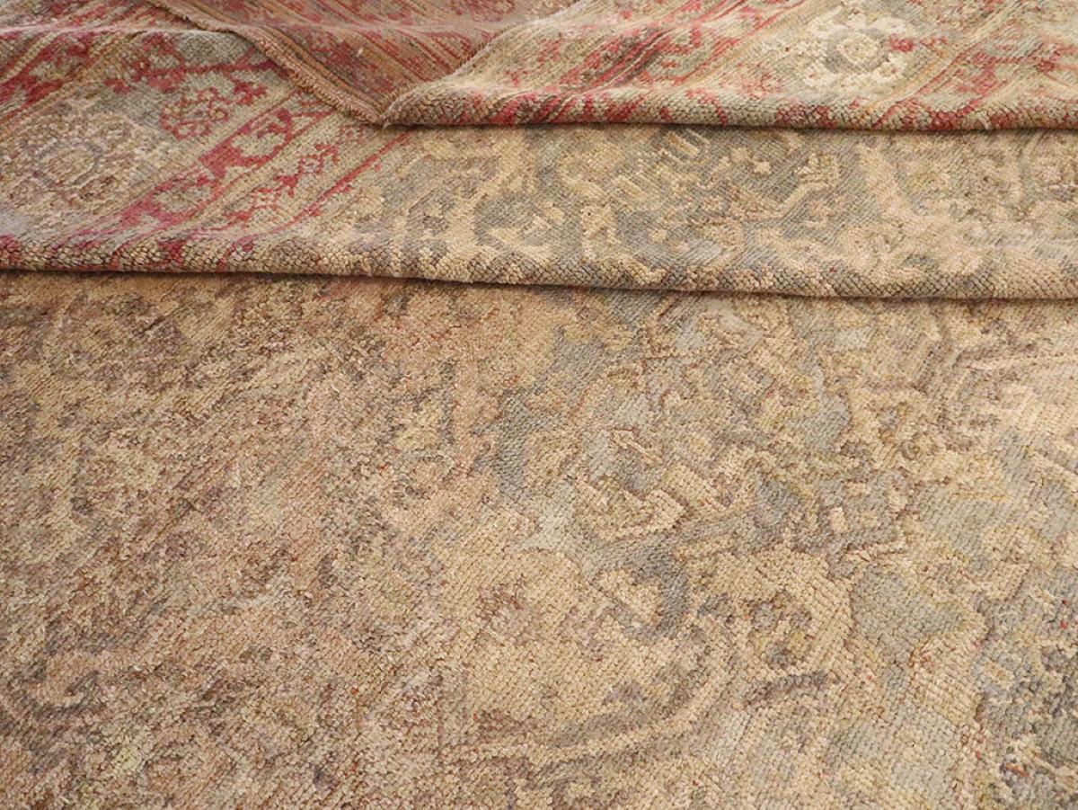 an early 20th Century Oversize Oushak Carpet

Details
rug no.	10461
size	13' 7