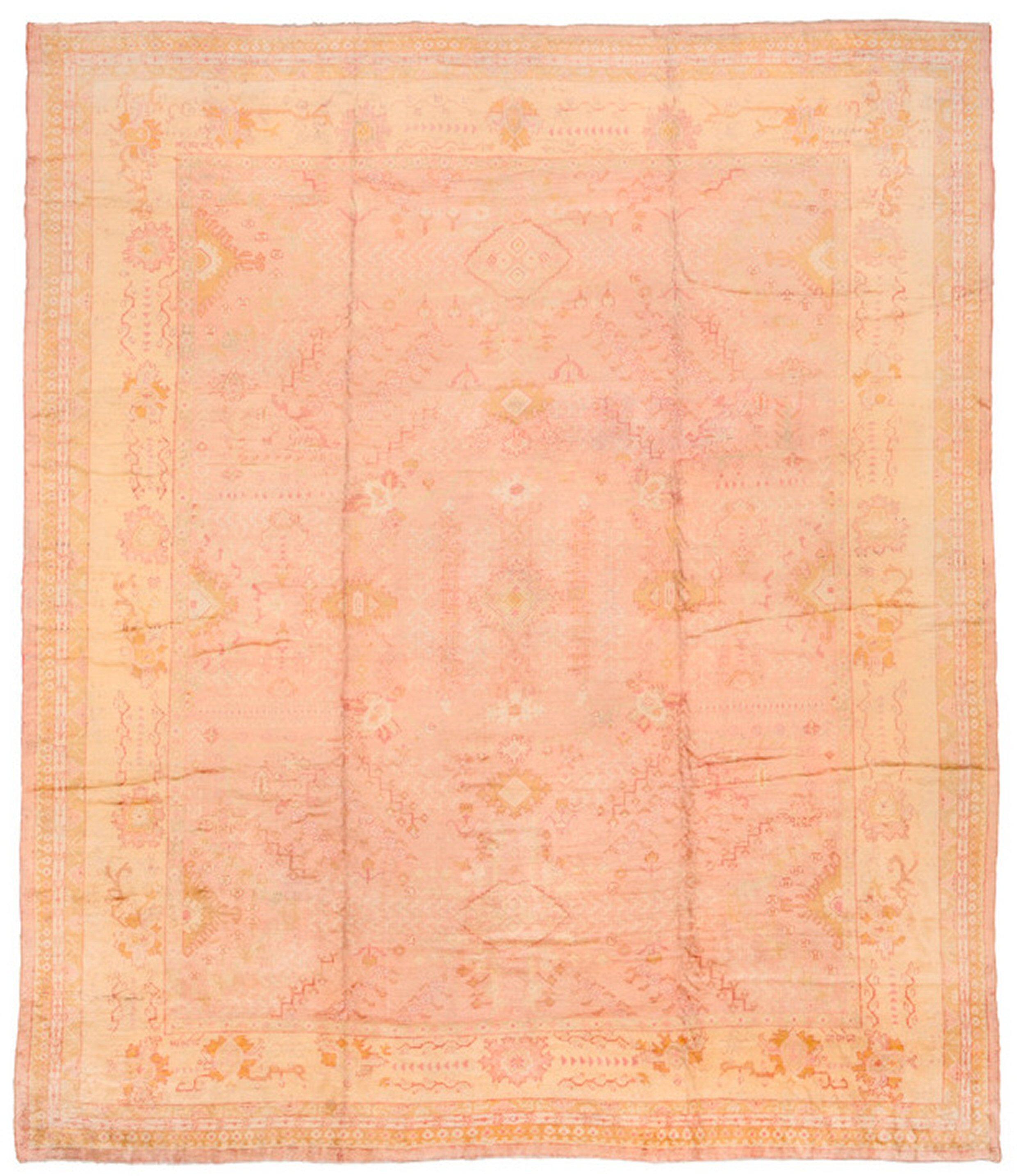 Ein antiker türkischer Oushak-Teppich aus dem frühen 20. Jahrhundert in zartem Rosa und Gold

Einzelheiten
Teppich nein.	10697
Größe	14' 11