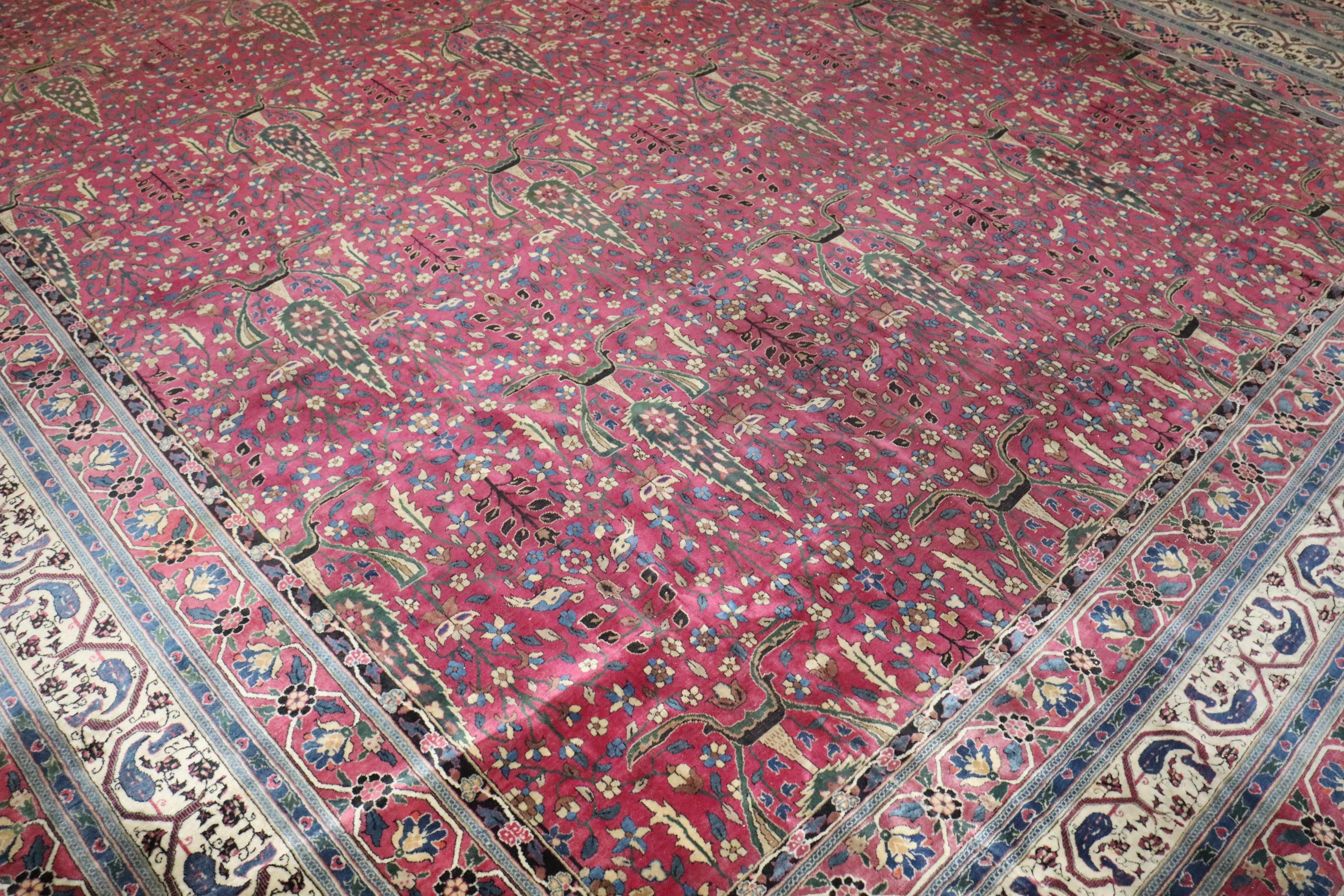 20th Century Zabihi Collection Oversize Plum Color Indian Antique Carpet For Sale