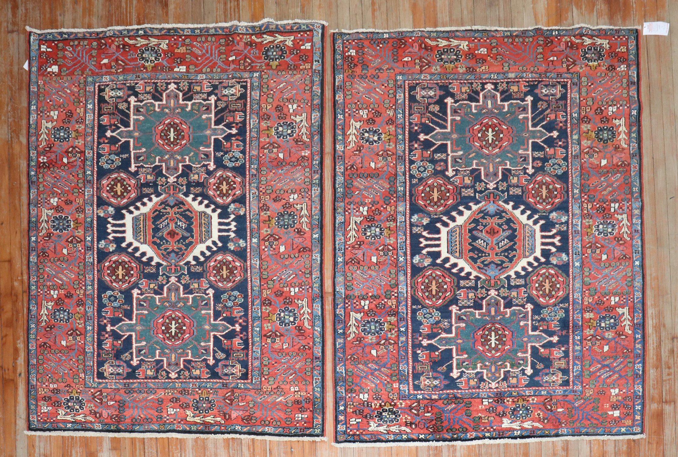 A pair of accent size Navy Field Persian Heriz rugs from the 1st quarter of the 20th century.

Measuring 4'10'' x 6' & 4'9'' x 6'1'' respectively.