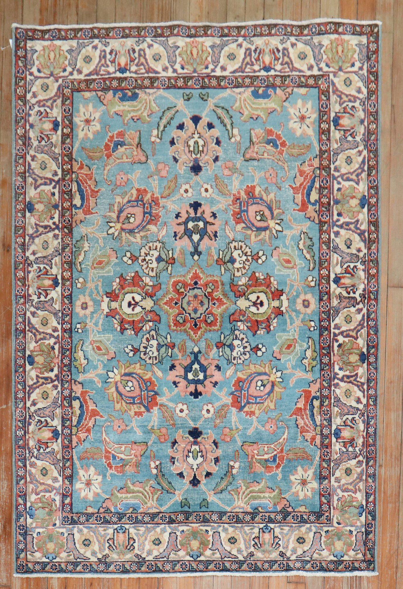 A set of Persian Tabriz scatter-size rugs from the early 20th Century. One is more faded and lighter than the other. 

Measure: 3'9'' x 5'5'' and 3'9'' x 5'4'' respectively.

