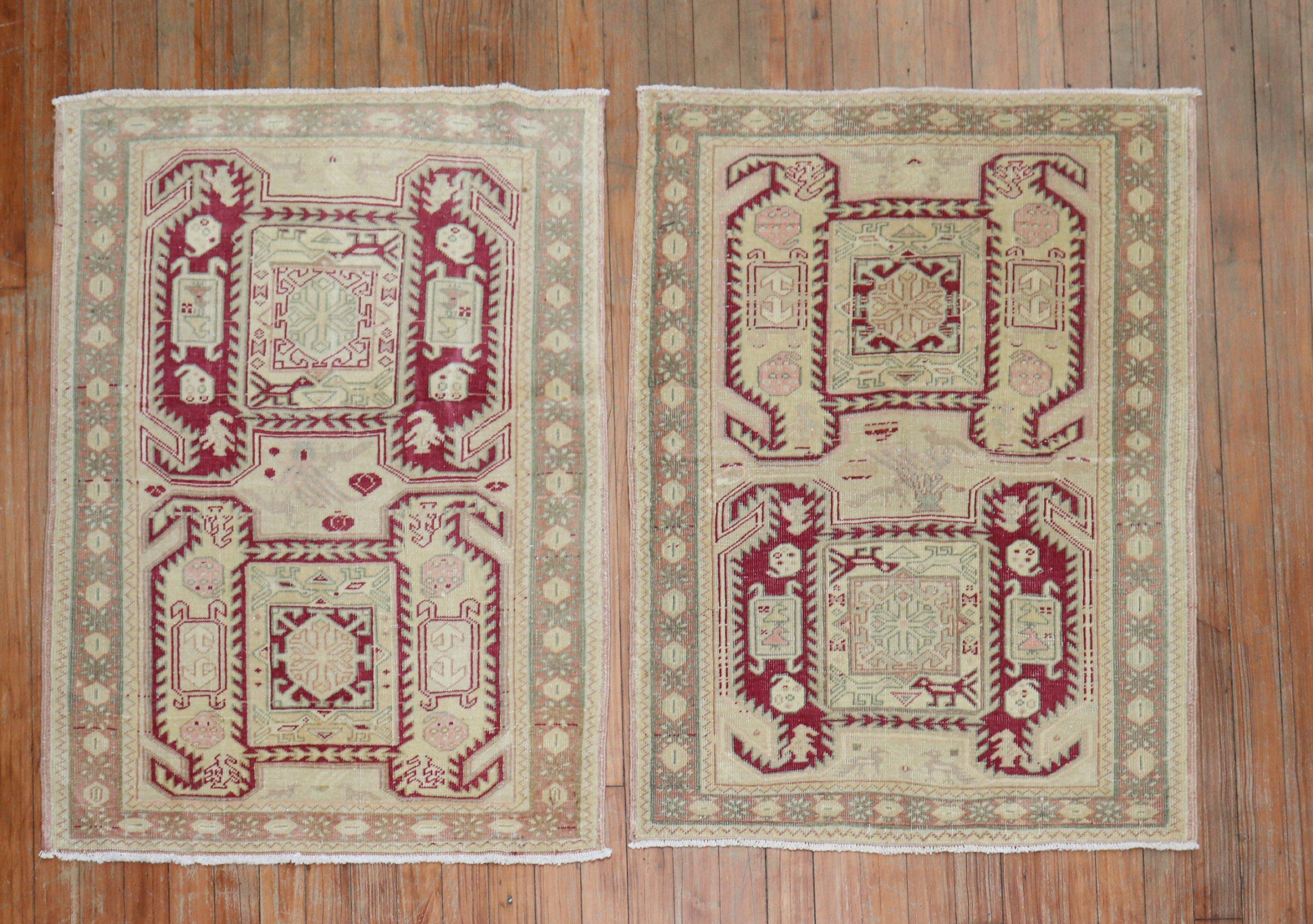 Matching Pair of mid 20th century Turkish rugs attributed from caucasian kazak patterns from the late 19th century

measuring 2'4'' x 3'3'' and 2'5'' x 3'3'' respectively  