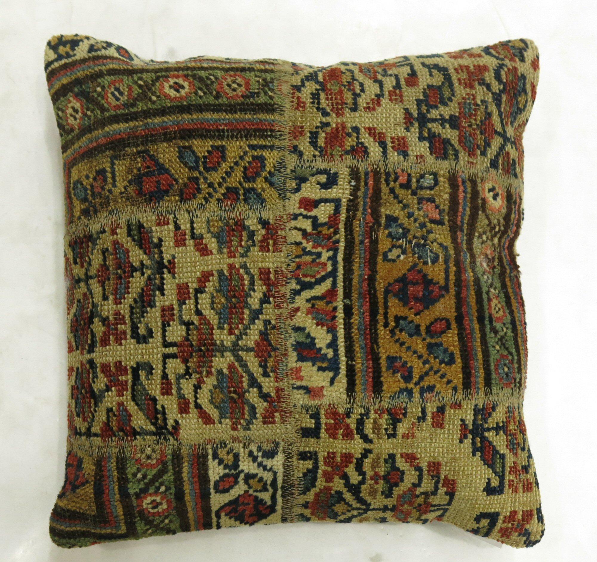 Pillow made into a patchwork format from a Kurdish Tribal rug.

17'' x 18'''