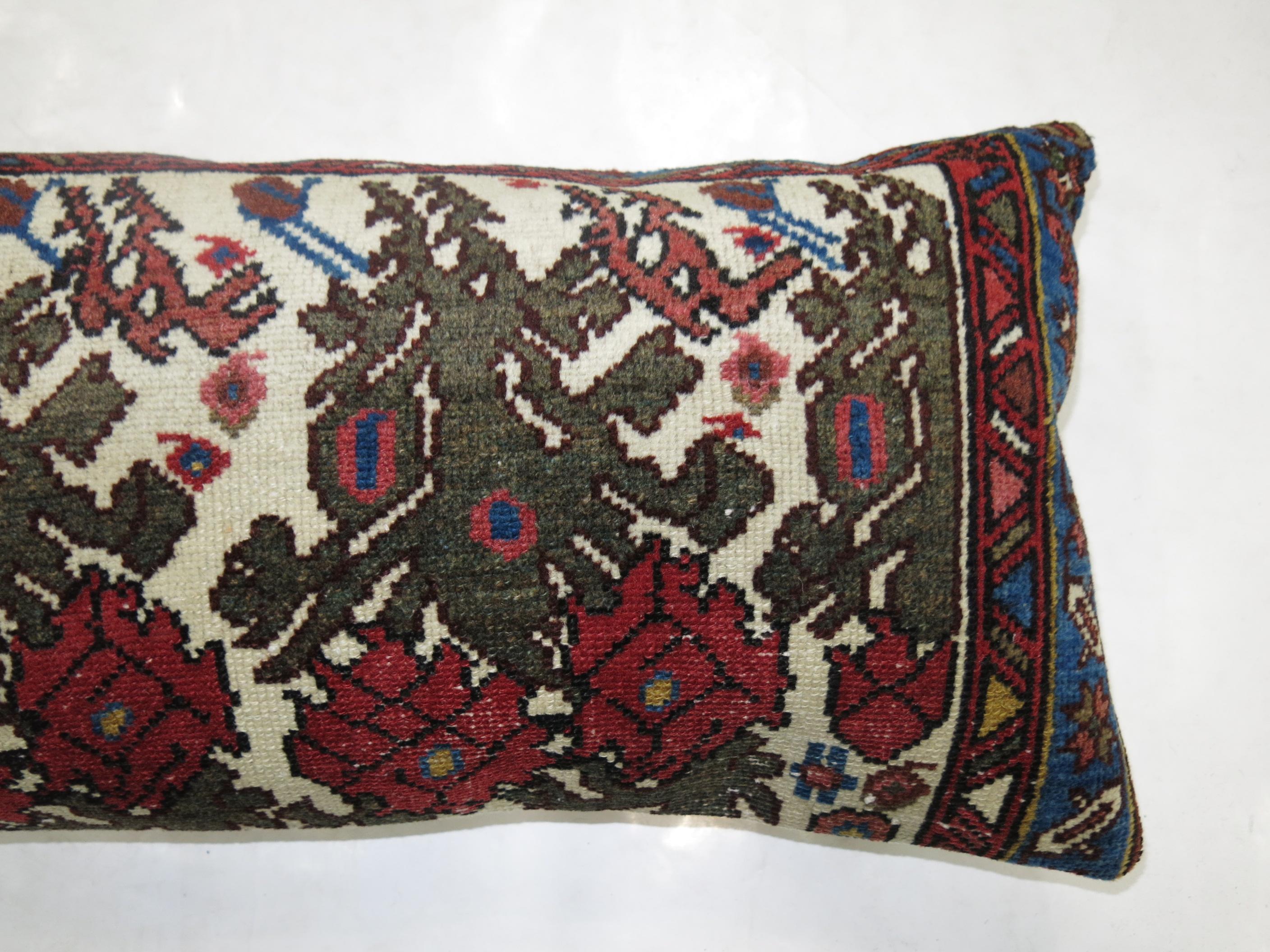 Bolster-size pillow from a vintage Persian rug.

14'' x 26''