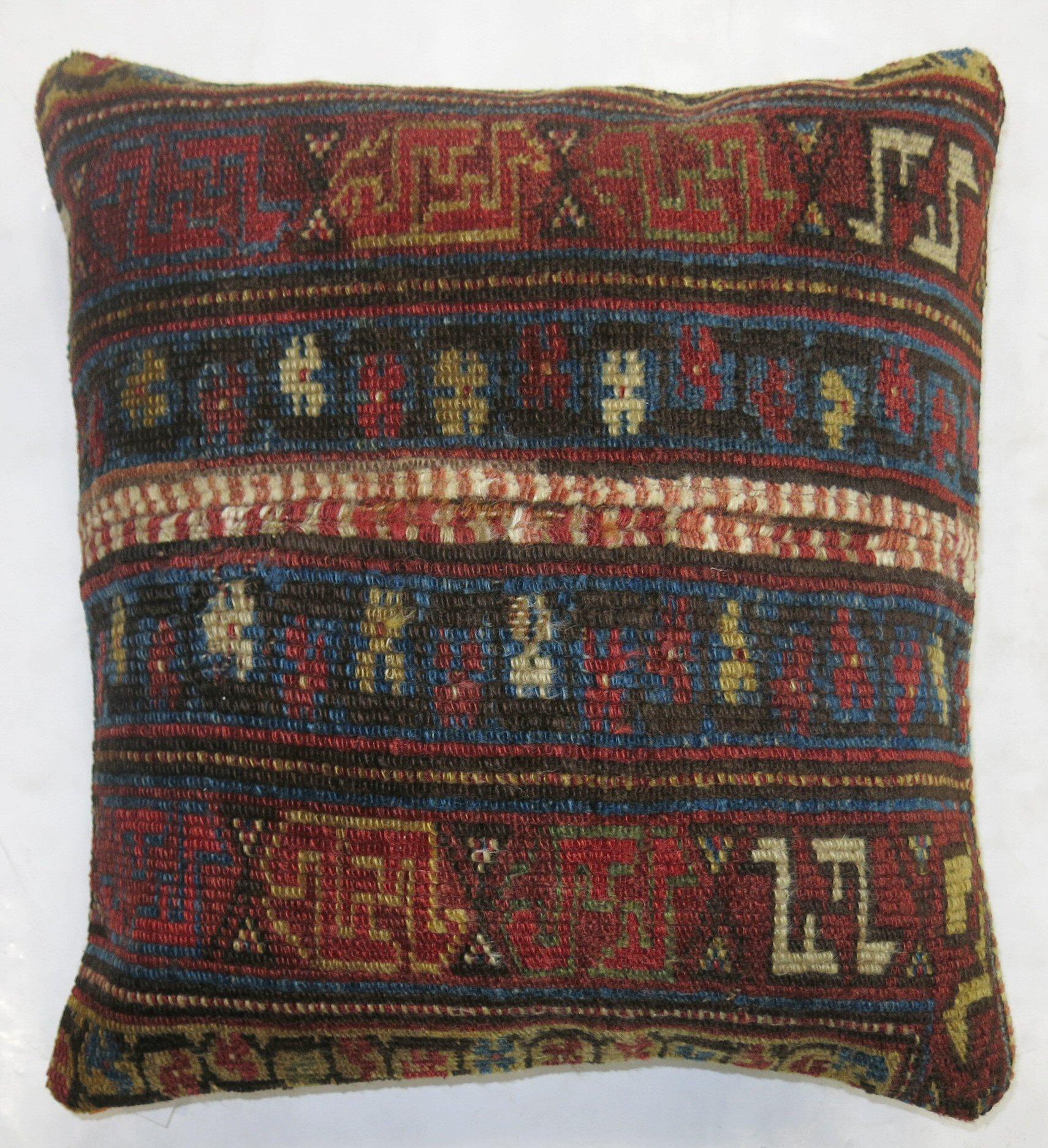 Pillow made from an early 20th century Persian rug.

Measures: 18