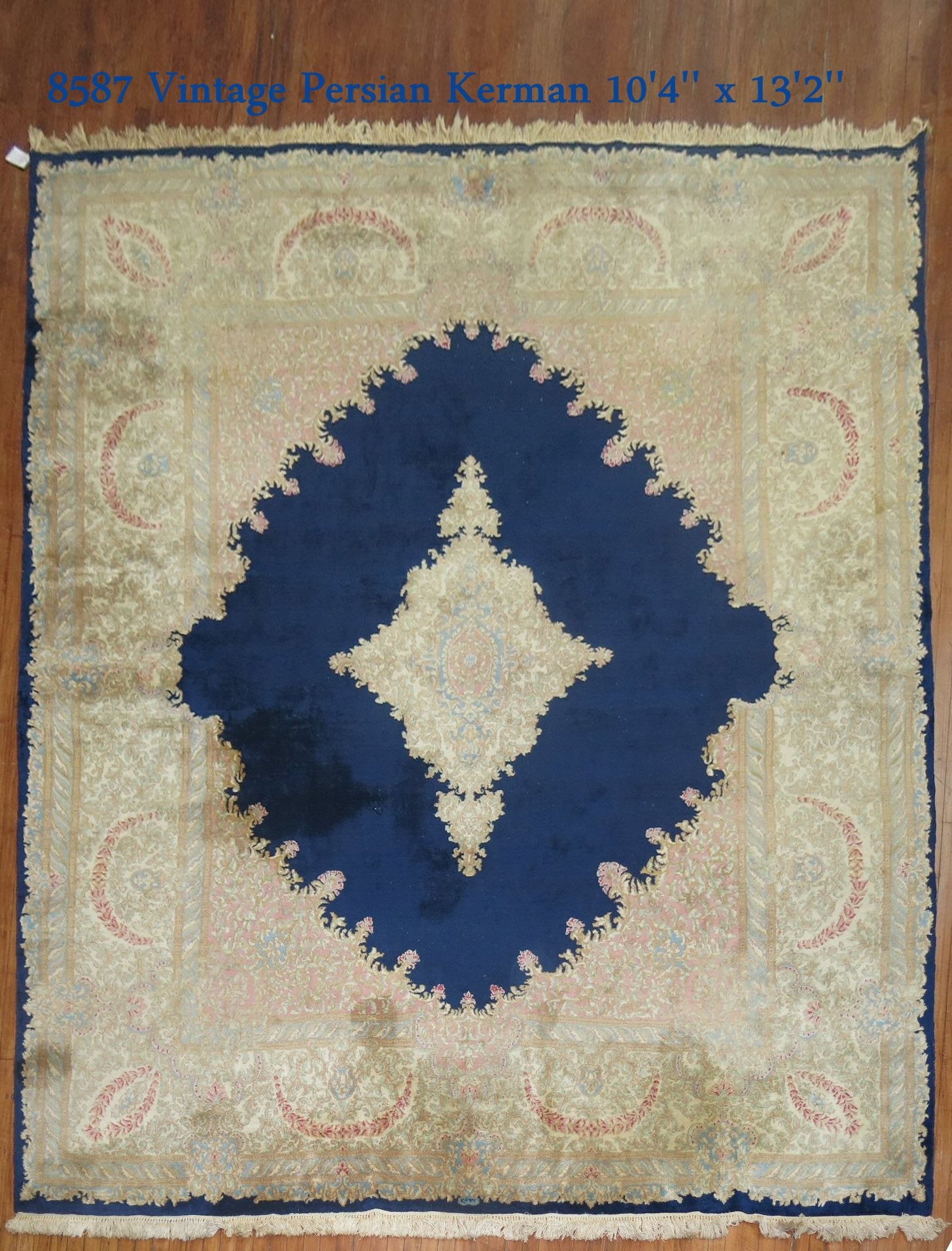A one of kind signed Persian Kerman Traditional rug from the 2nd quarter of the 20th century

Measures: 10'4