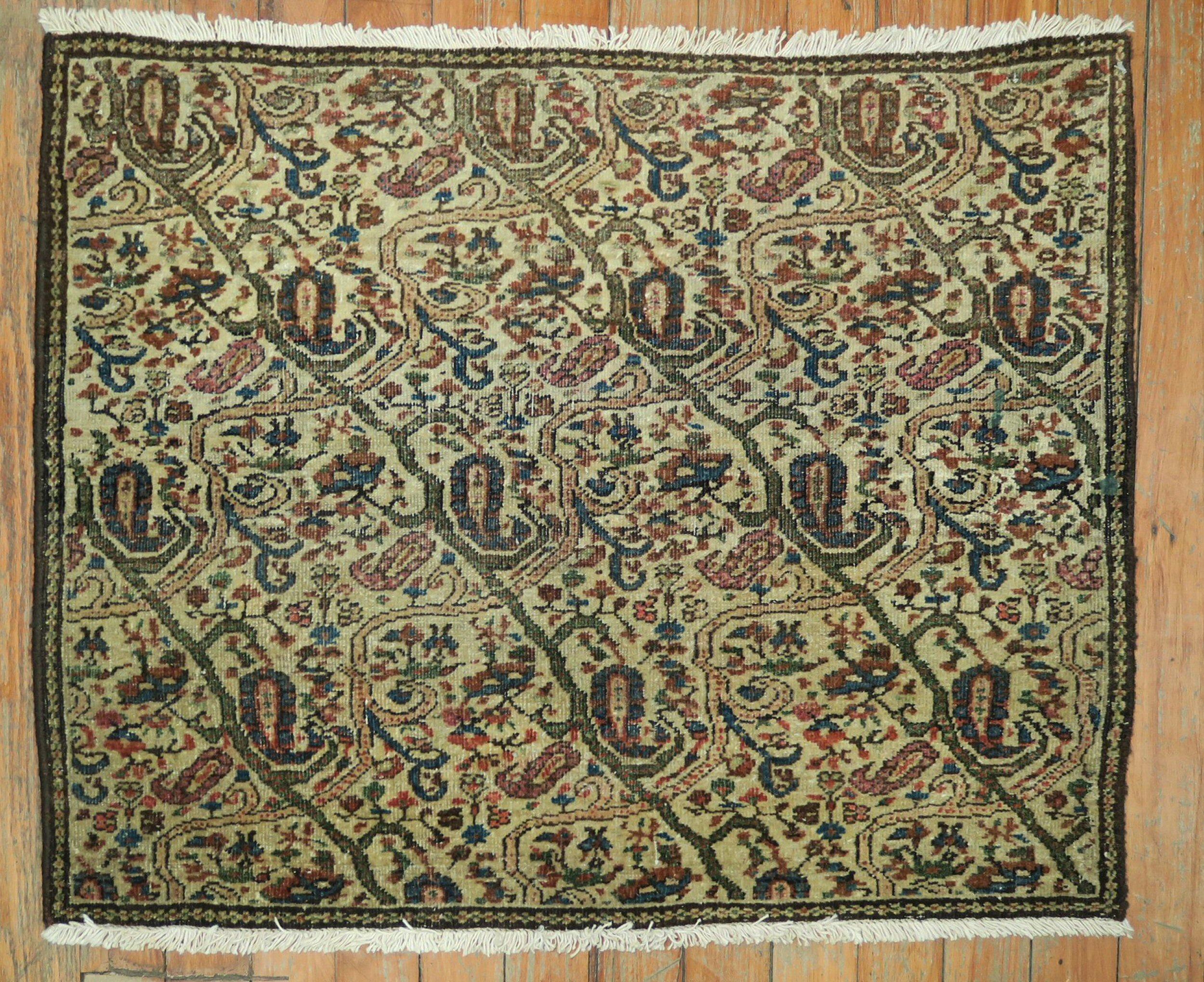 an early 20th Century Persian Fereghan mini square size rug

22'' x 28''