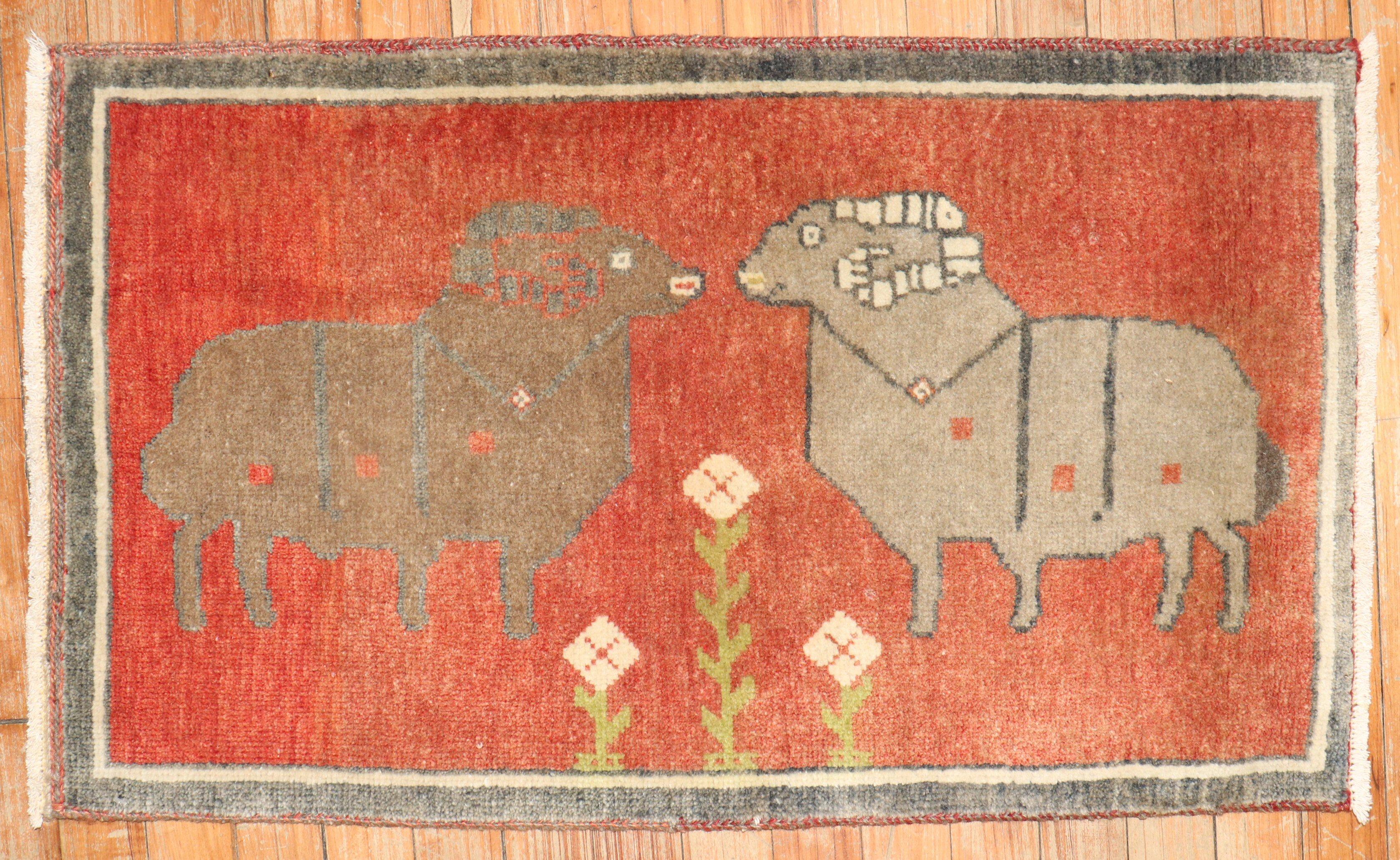 mid 20th Century Turkish Pictorial Rug with 2 sheep rams on a red field

Details
rug no.	31797
size	1' 8