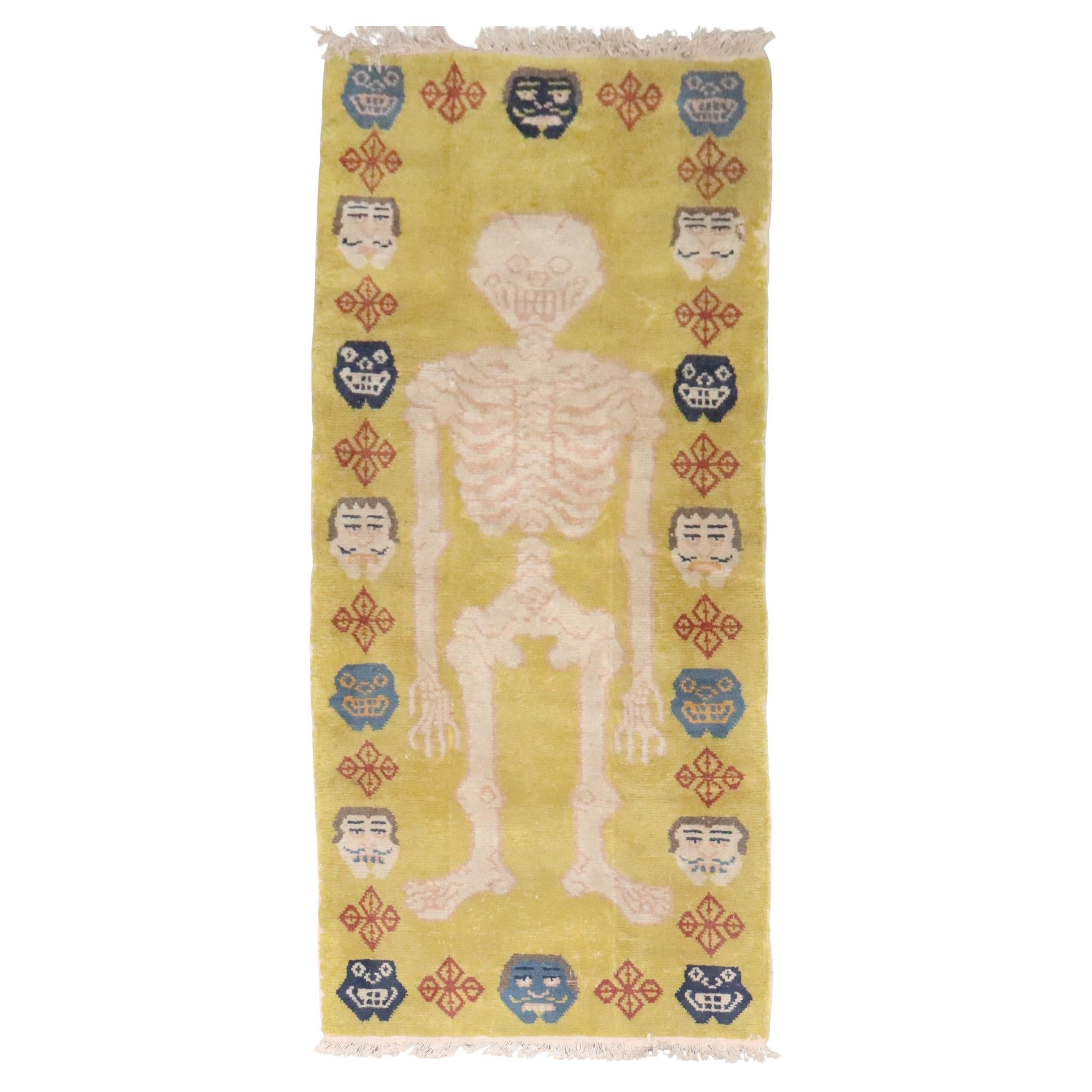 Zabihi Collection Pictorial Skeleton Vintage Tibetan Rug, 20th Century For Sale
