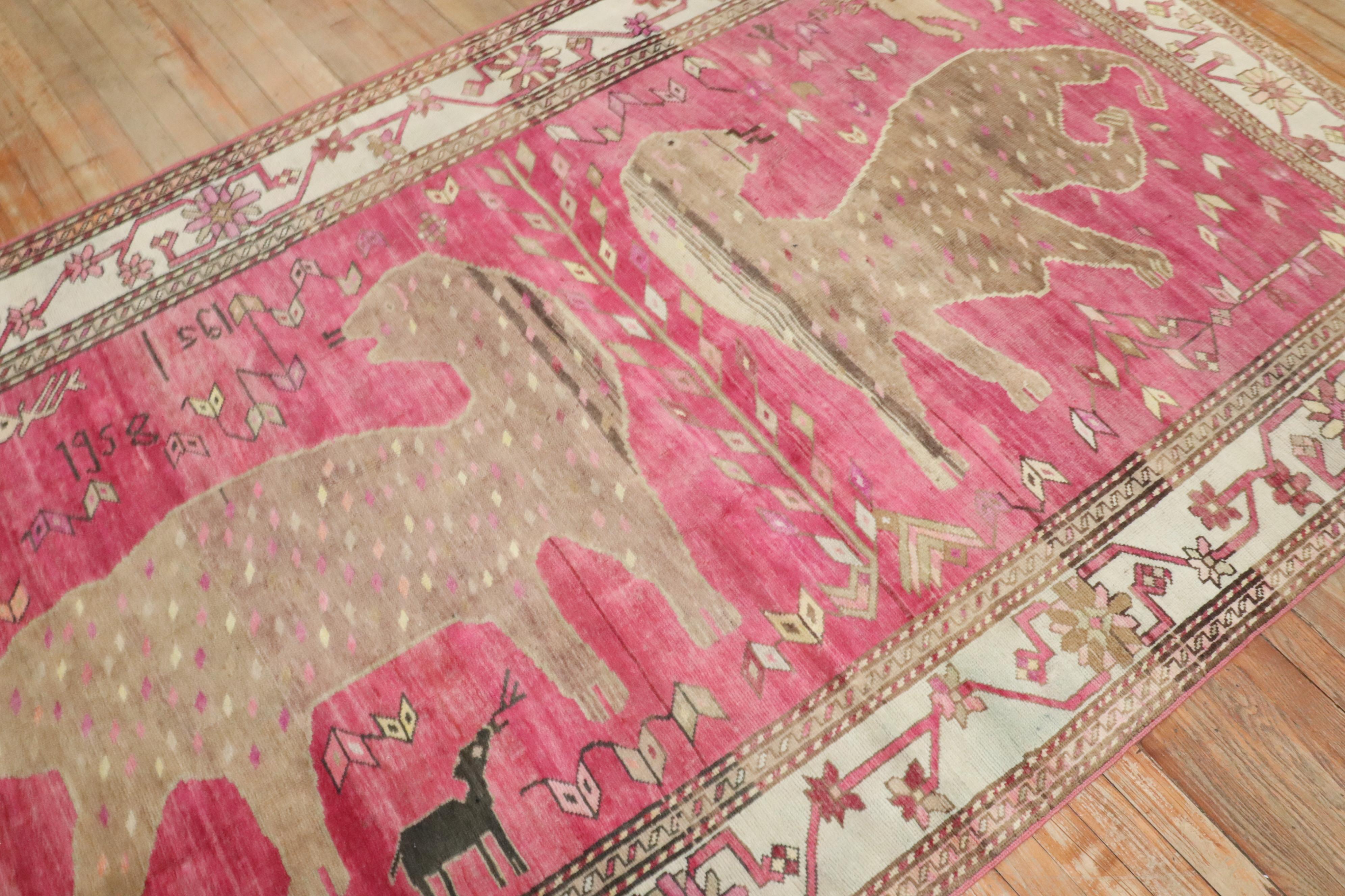 A rare armenian Rug depicting 2 Komodo Dragons on a pink fuchsia field 

Measures: 5'2'' x 9'4''.