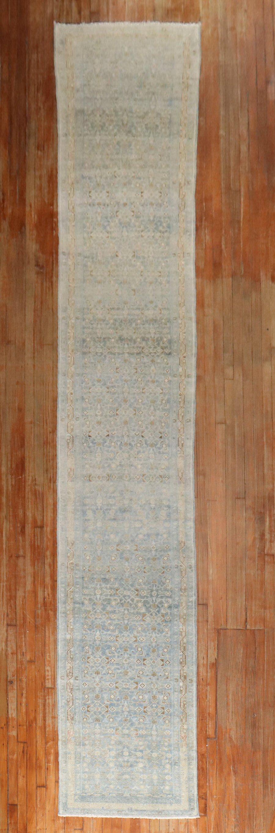 An early 20th century long and narrow powder blue color Persian Bibikabad Runner

2'9'' x 18'10''

