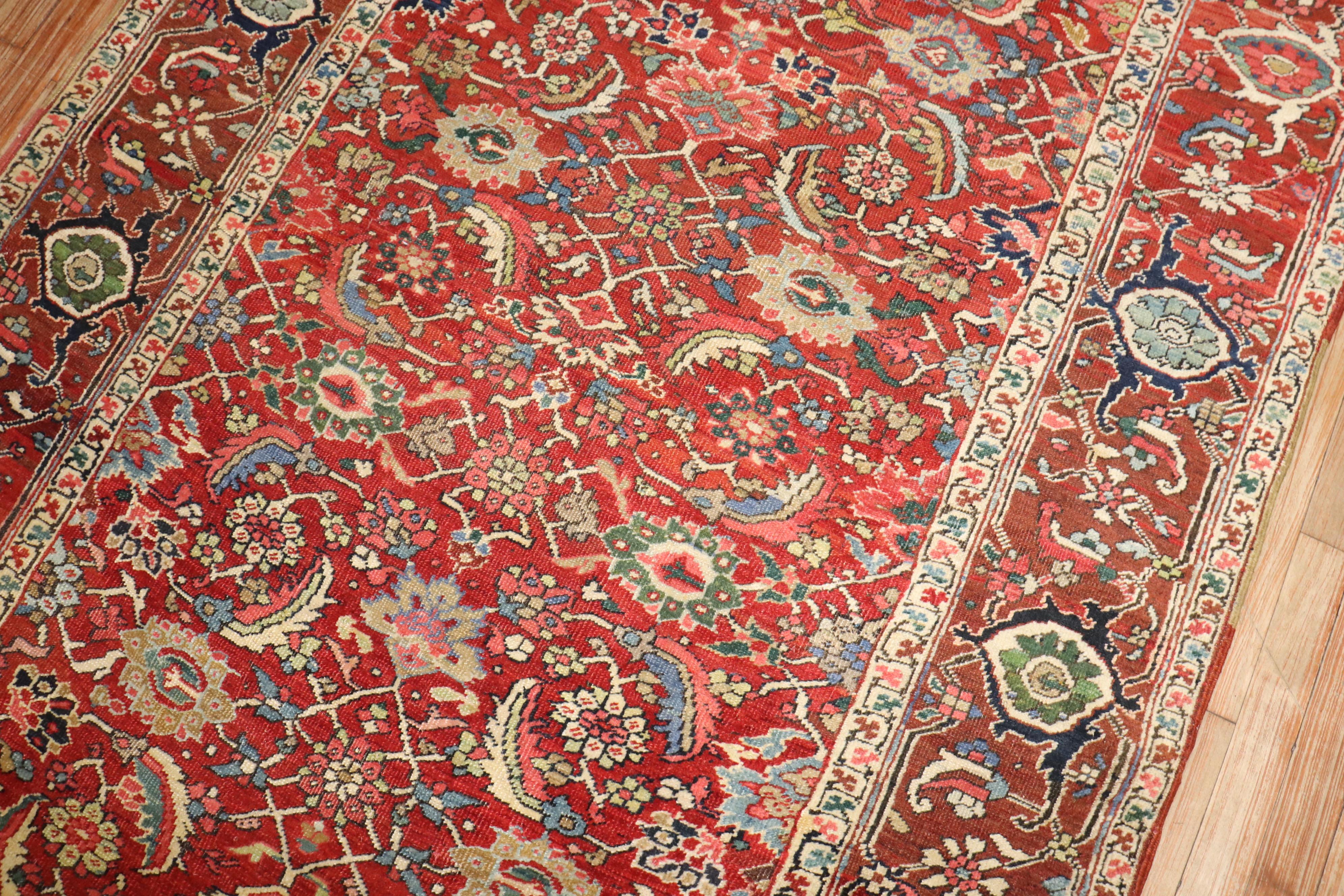 20th Century Zabihi Collection Red Antique Persian Serapi Rug For Sale