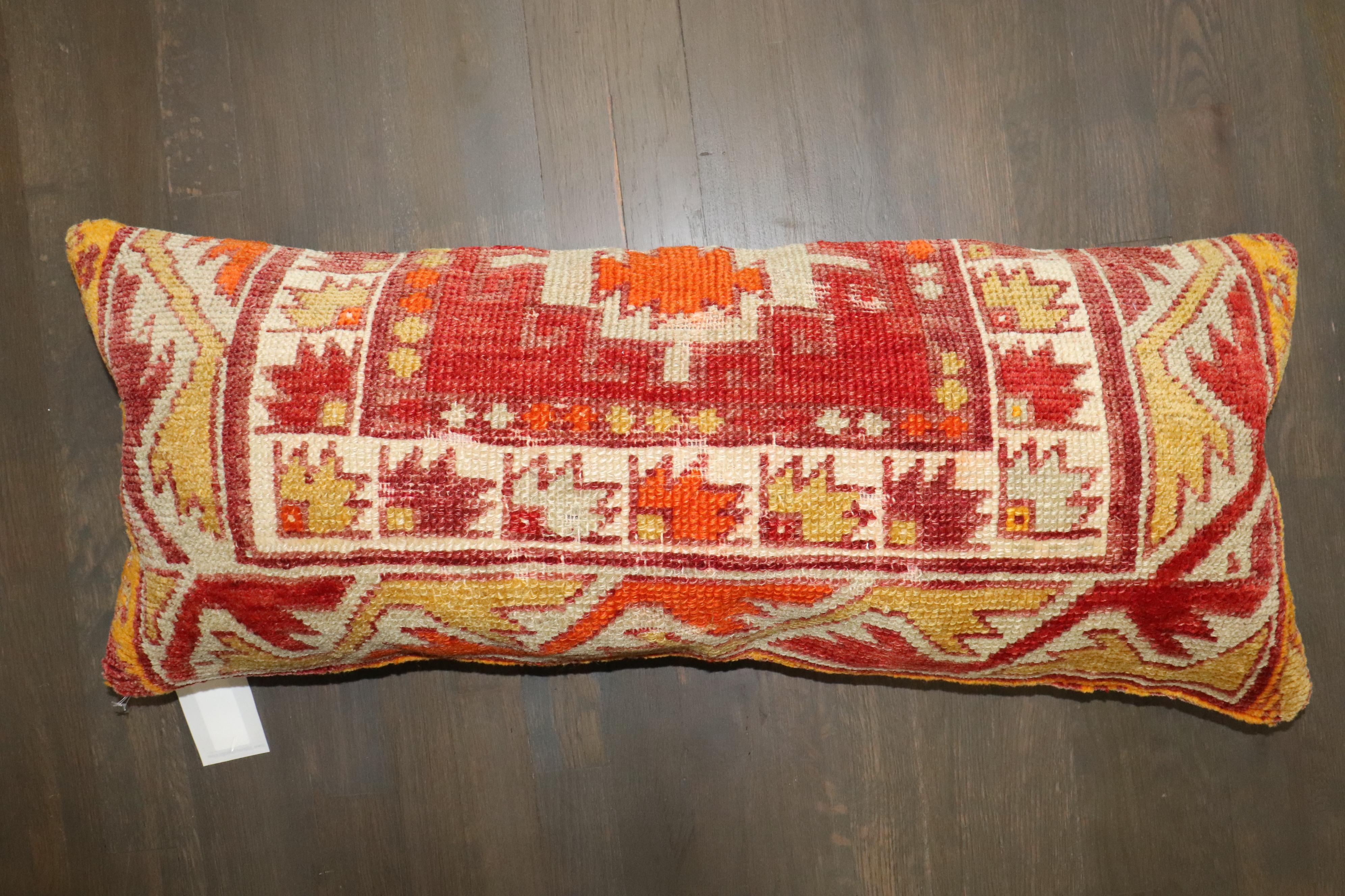 Large bolster size Pillow made from an early 20th century Turkish Anatolian Rug

Measures: 14