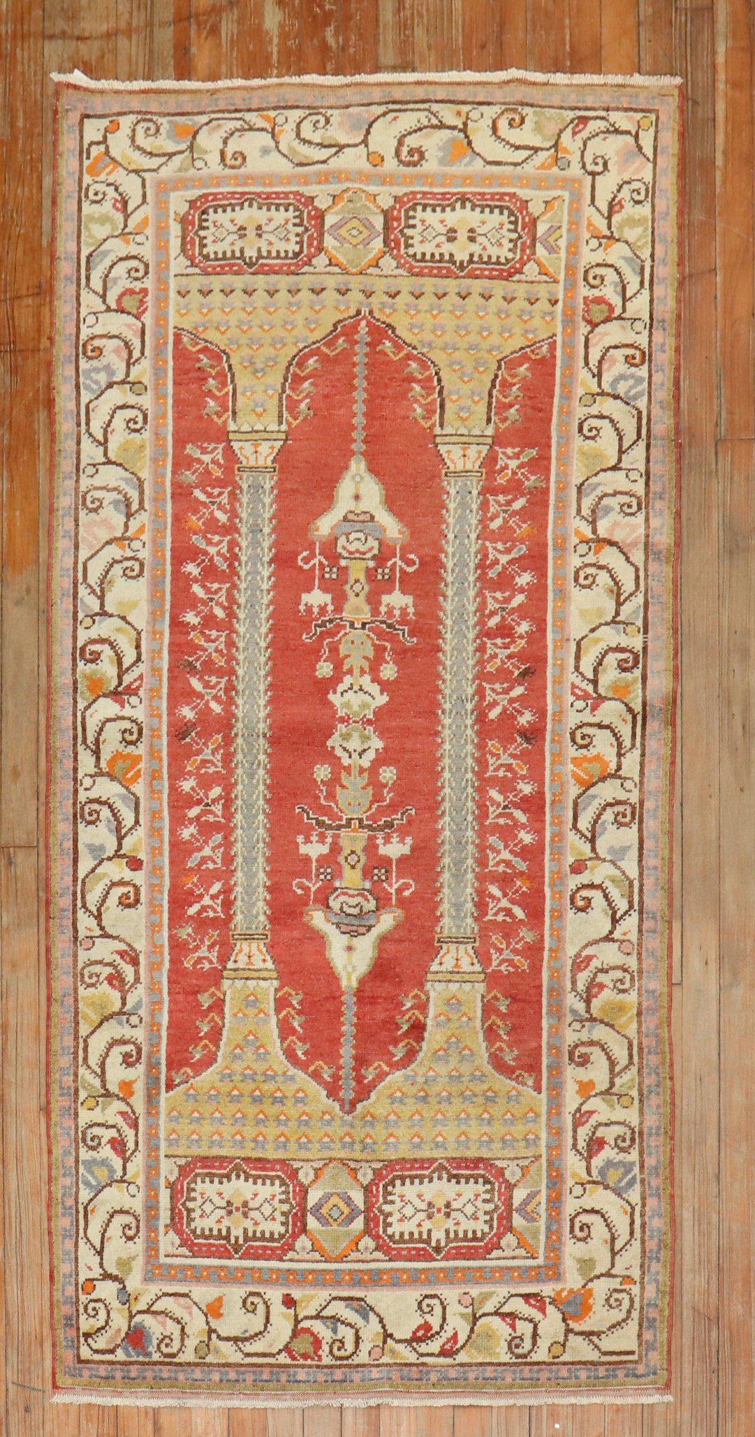 Midcentury Turkish rug with a double column scroll prayer motif on red field

Size: 3'3