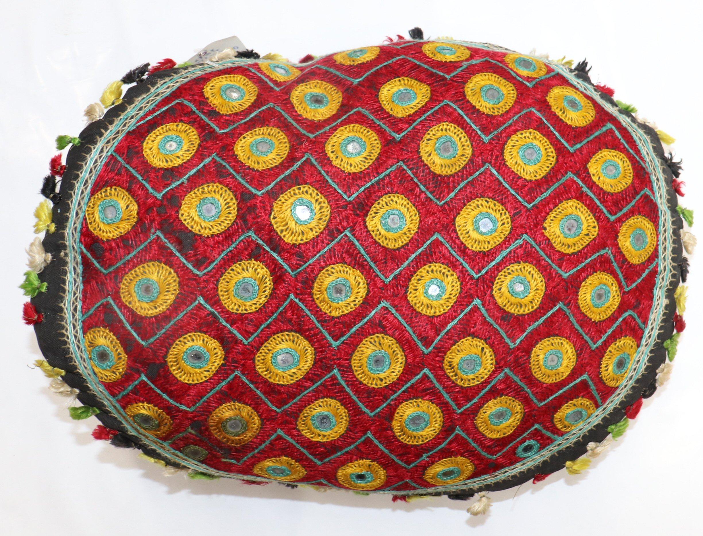 A pillow made with a Indian Textile

Measures: 16'' x 18''.