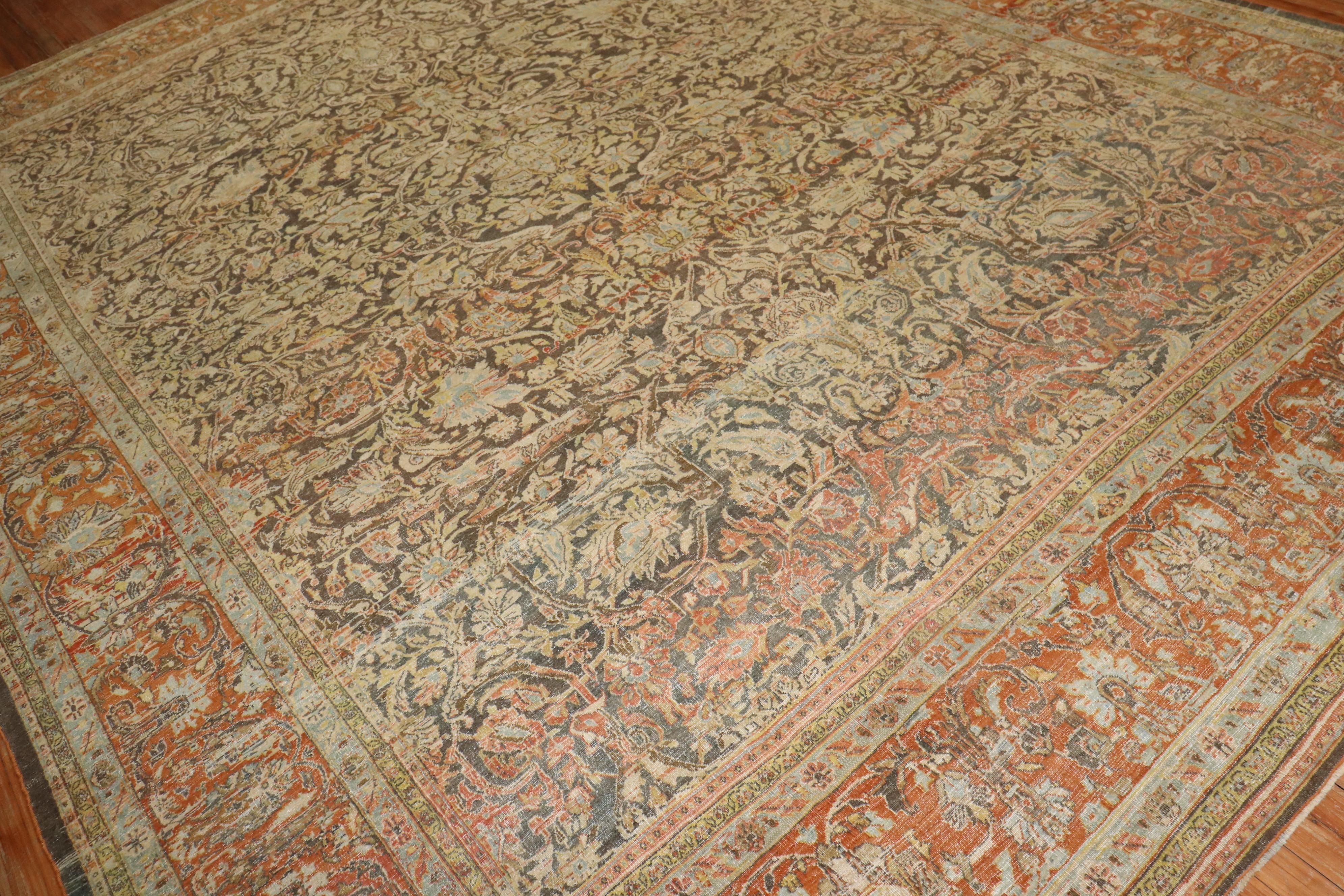 20th Century Zabihi Collection Rustic Antique Persian Bidjar Rug For Sale