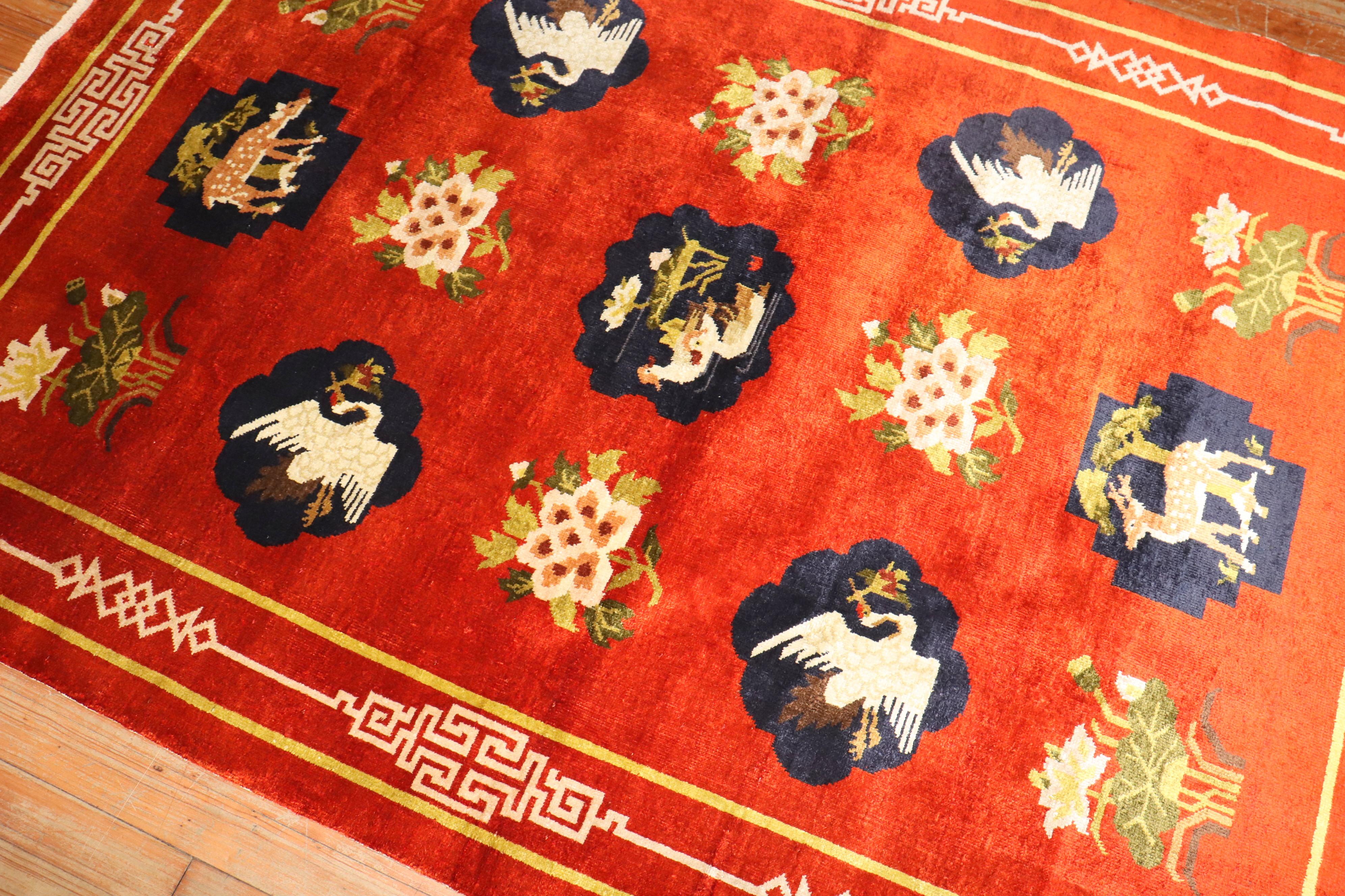 A Chinese silk pictorial animal motif rug from the 3rd quarter of the 20th century

4'2'' x 5'11''