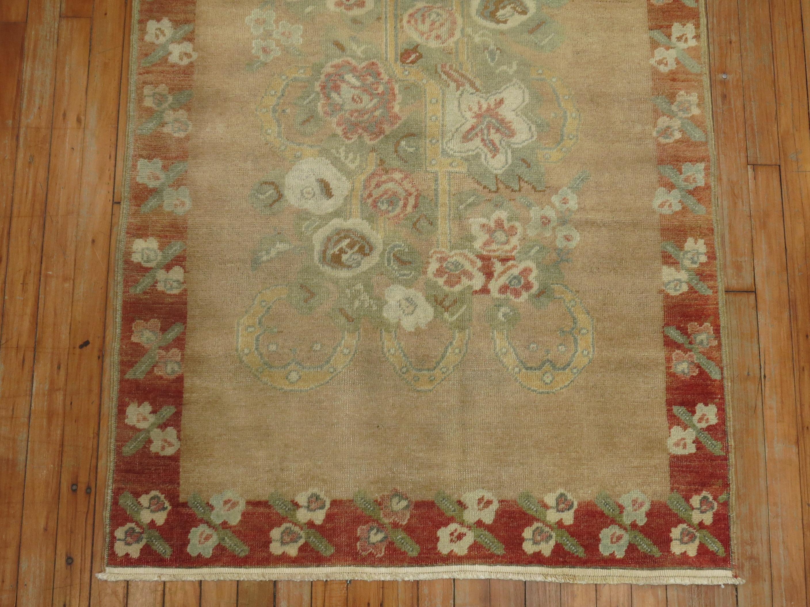 A Throw Size Turkish Floral Anatolian Rug from the middle of the 20th Century

Details
rug no.	31261
size	3' 5