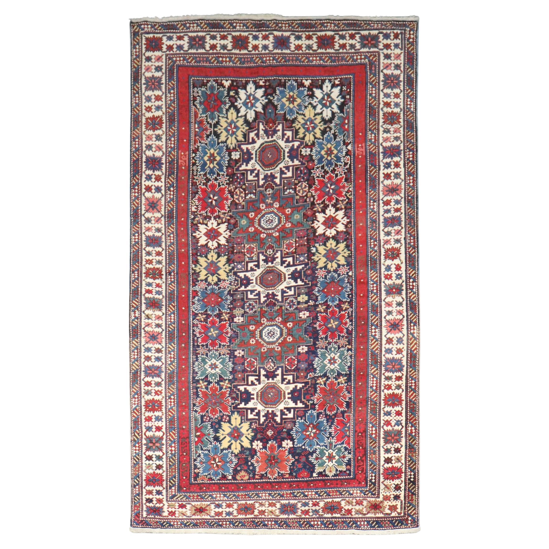 Zabihi Collection Snowflake Antique Leshgi Caucasian Intermediate Size Rug For Sale